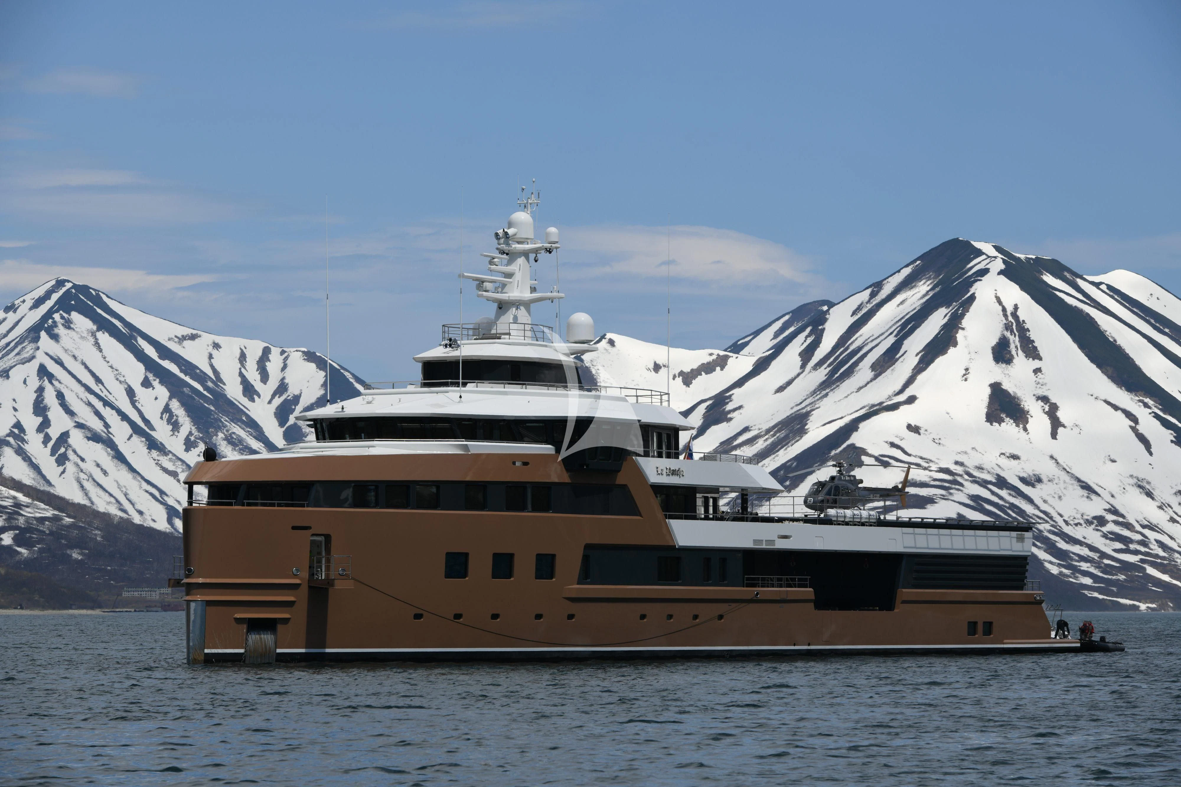 a large ship in the water aboard LA DATCHA Yacht for Sale