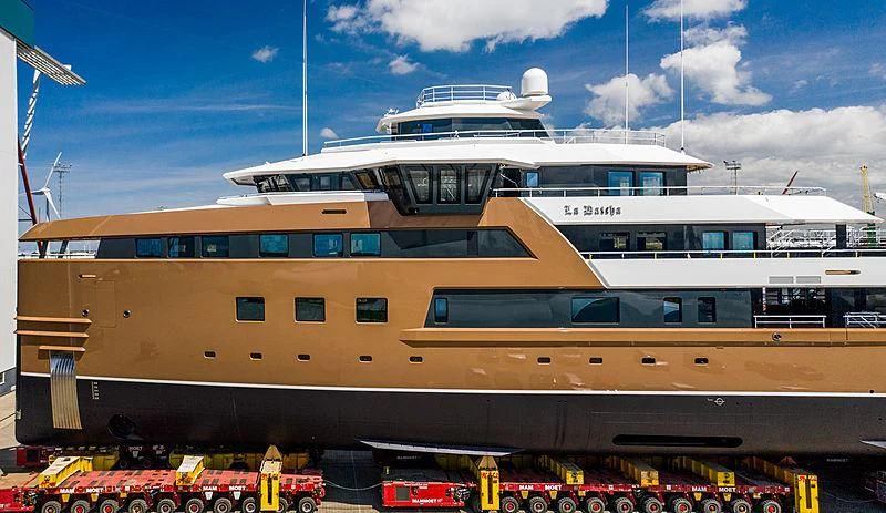a large ship in a harbor aboard LA DATCHA Yacht for Sale