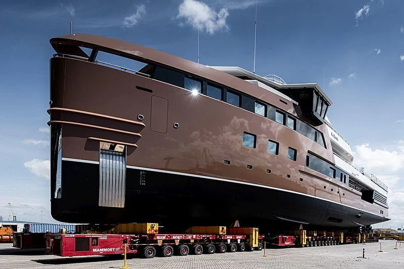a large ship with a trailer aboard LA DATCHA Yacht for Sale
