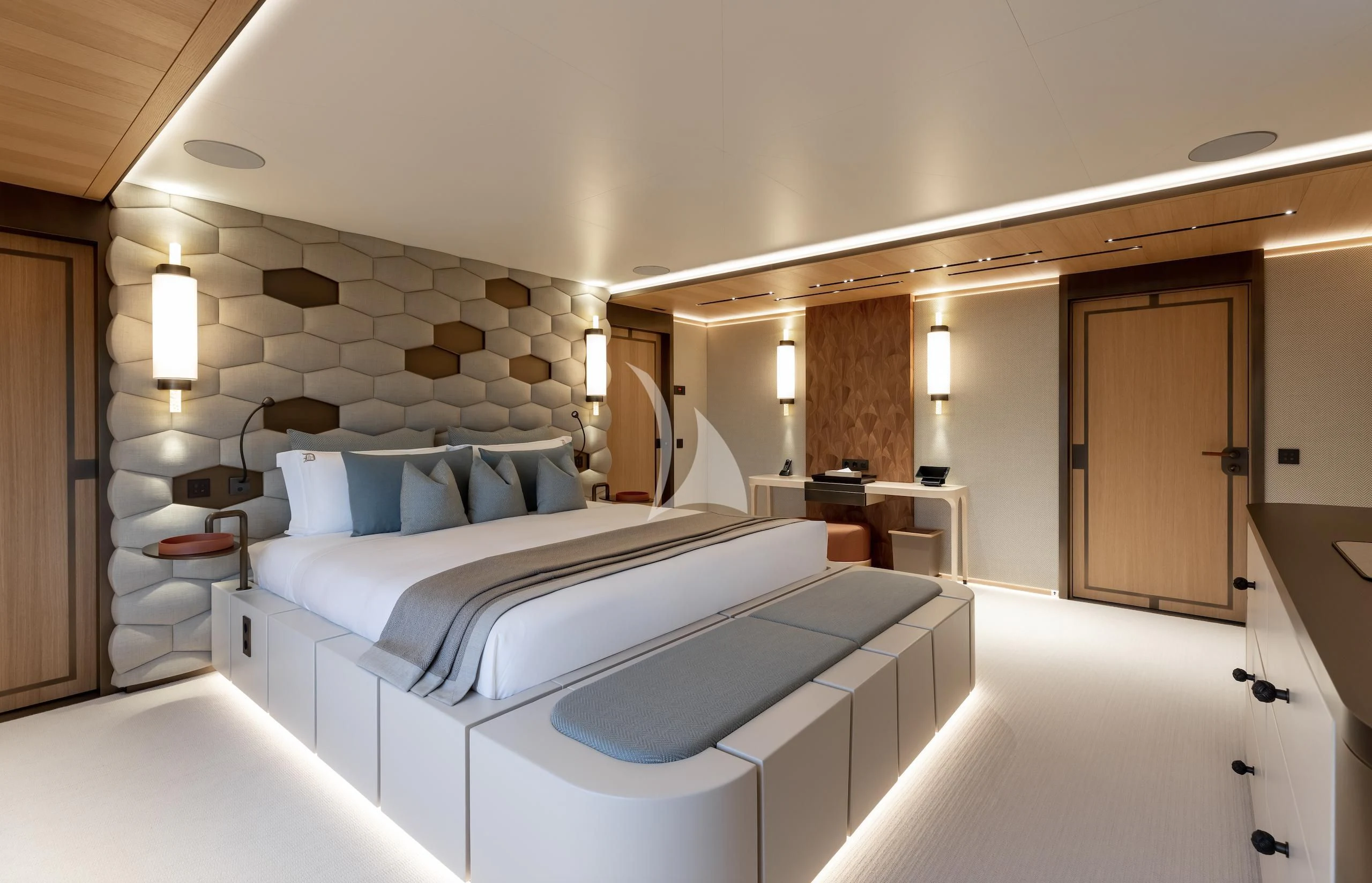 a room with a bed and a mirror aboard LA DATCHA Yacht for Sale