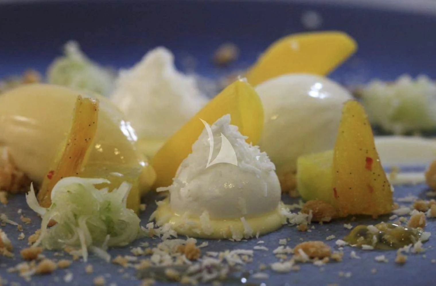 a plate of food aboard LA DATCHA Yacht for Sale