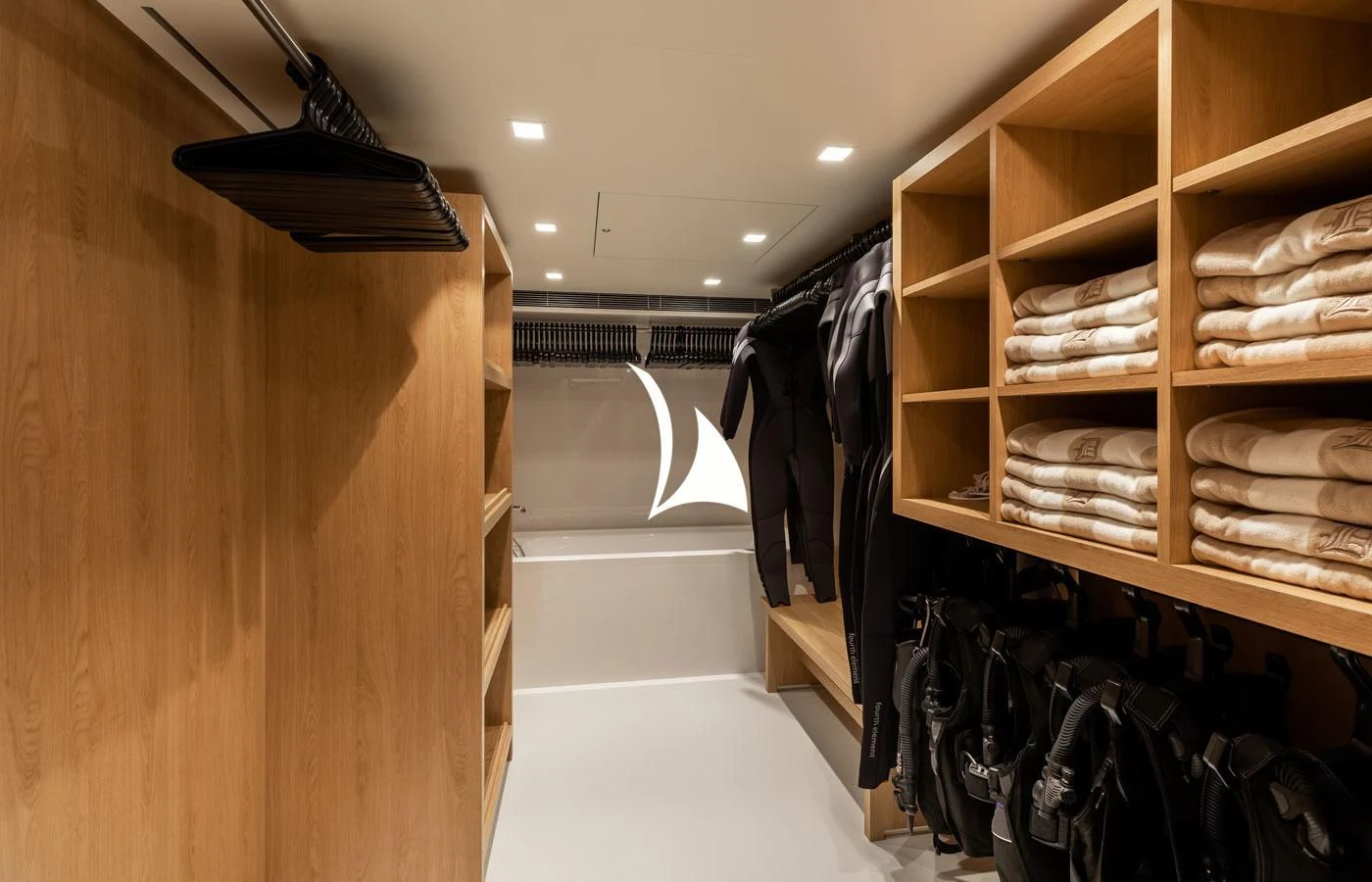 a large room with shelves and clothes aboard LA DATCHA Yacht for Sale