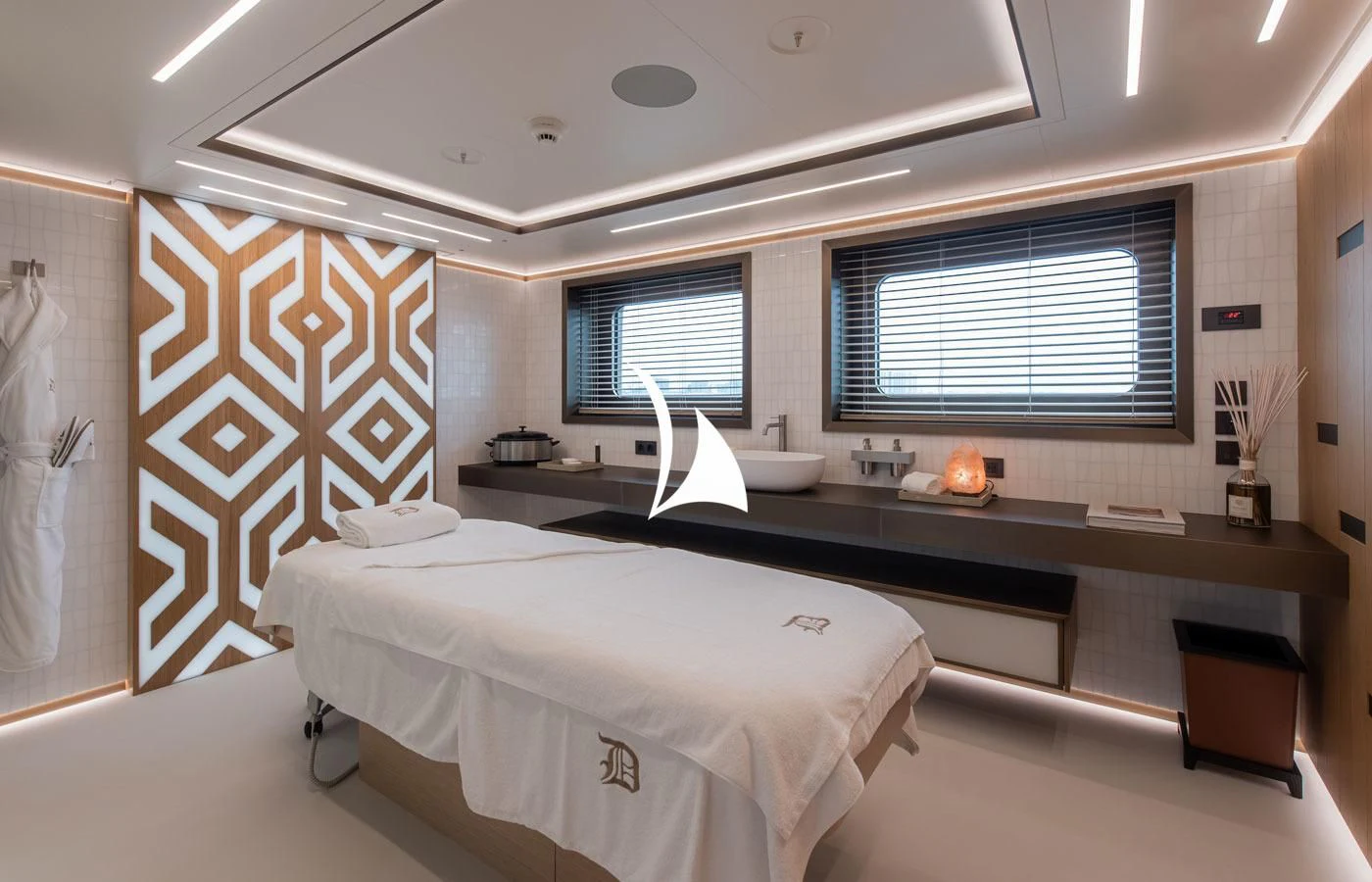 a bed with a white sheet aboard LA DATCHA Yacht for Sale