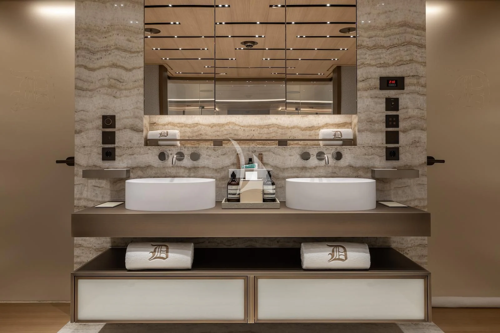 a bathroom with sinks and mirrors aboard LA DATCHA Yacht for Sale