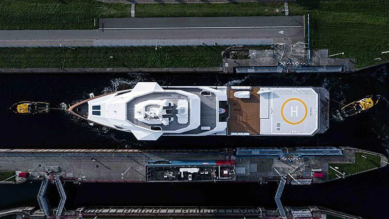 a car on a road aboard LA DATCHA Yacht for Sale