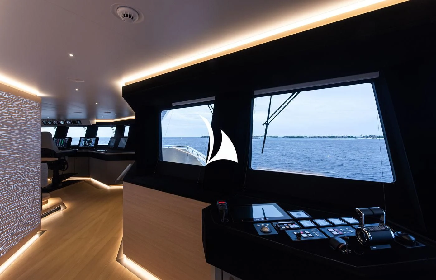 a room with a large screen aboard LA DATCHA Yacht for Sale