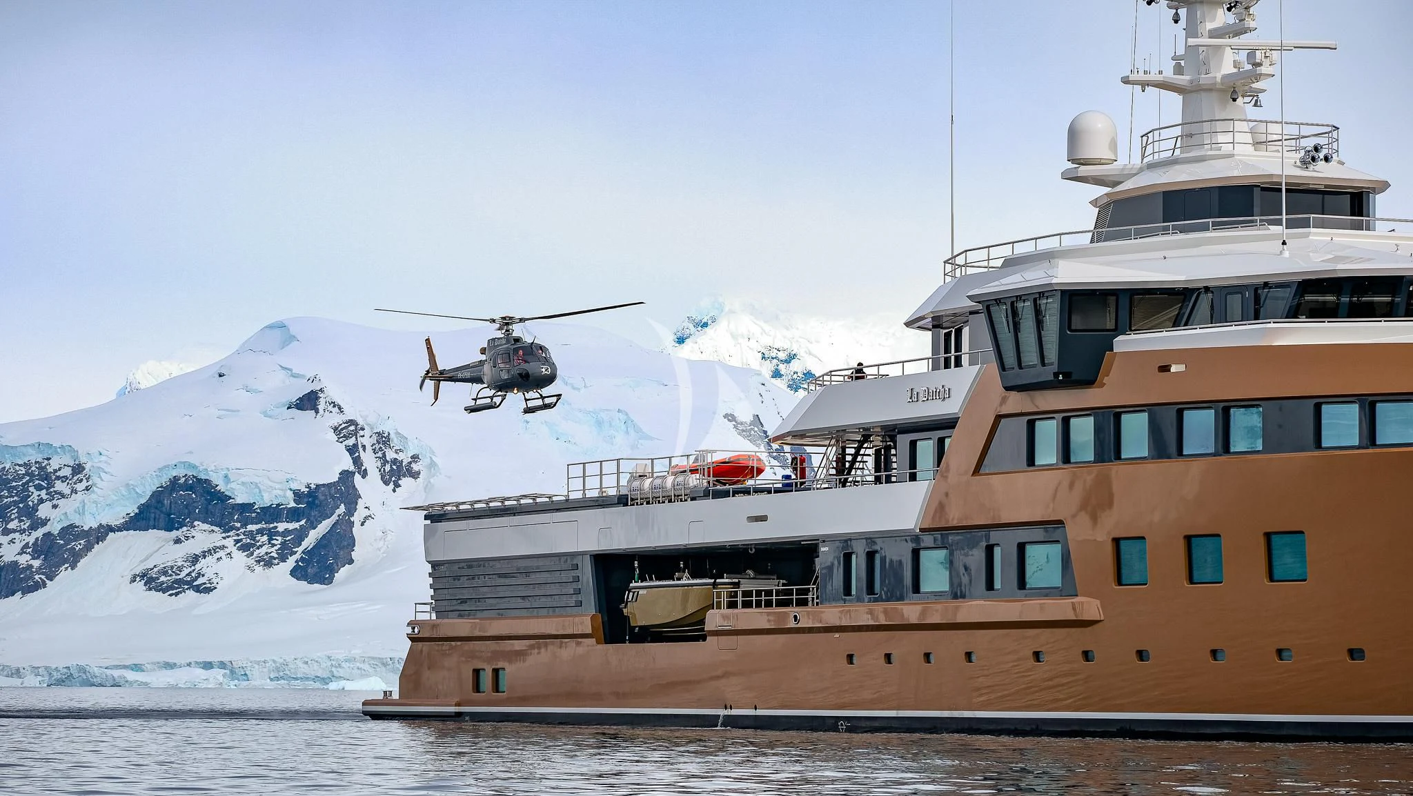 helicopter flying over a ship aboard LA DATCHA Yacht for Sale