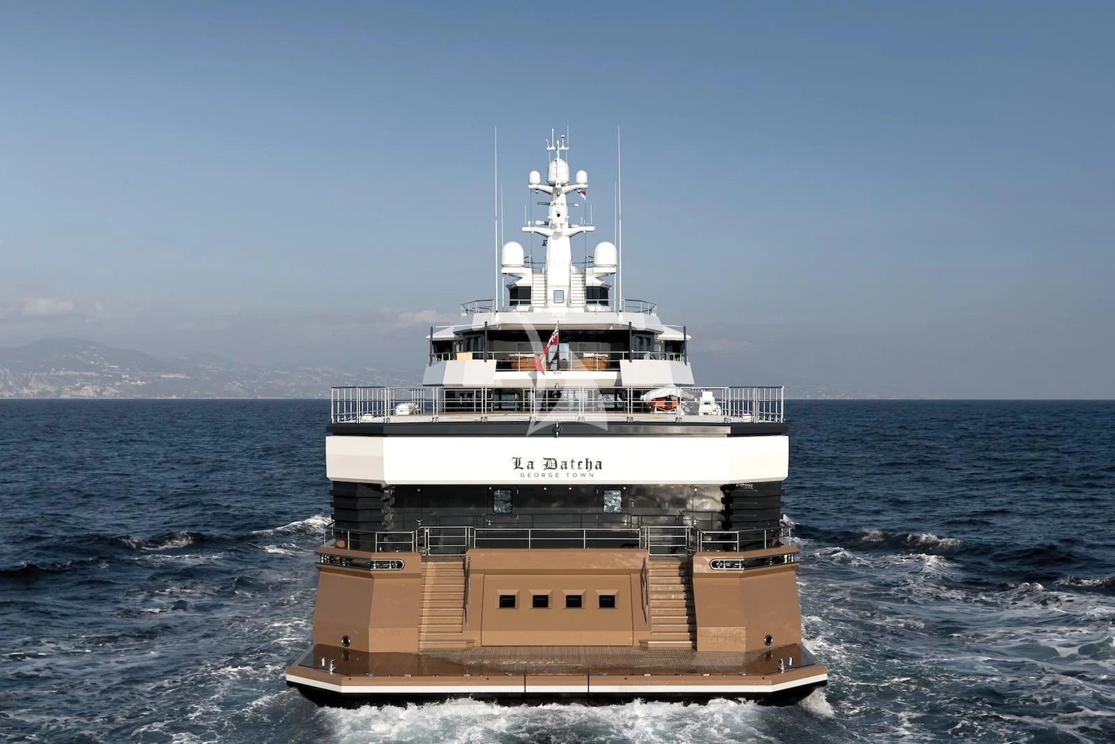 a large ship in the water aboard LA DATCHA Yacht for Sale