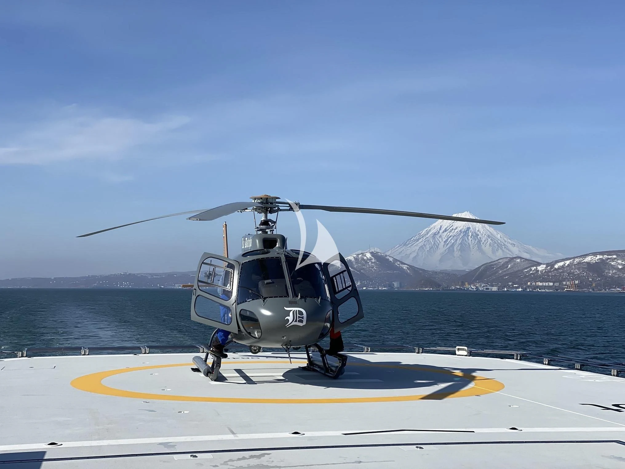 a helicopter on a runway aboard LA DATCHA Yacht for Sale