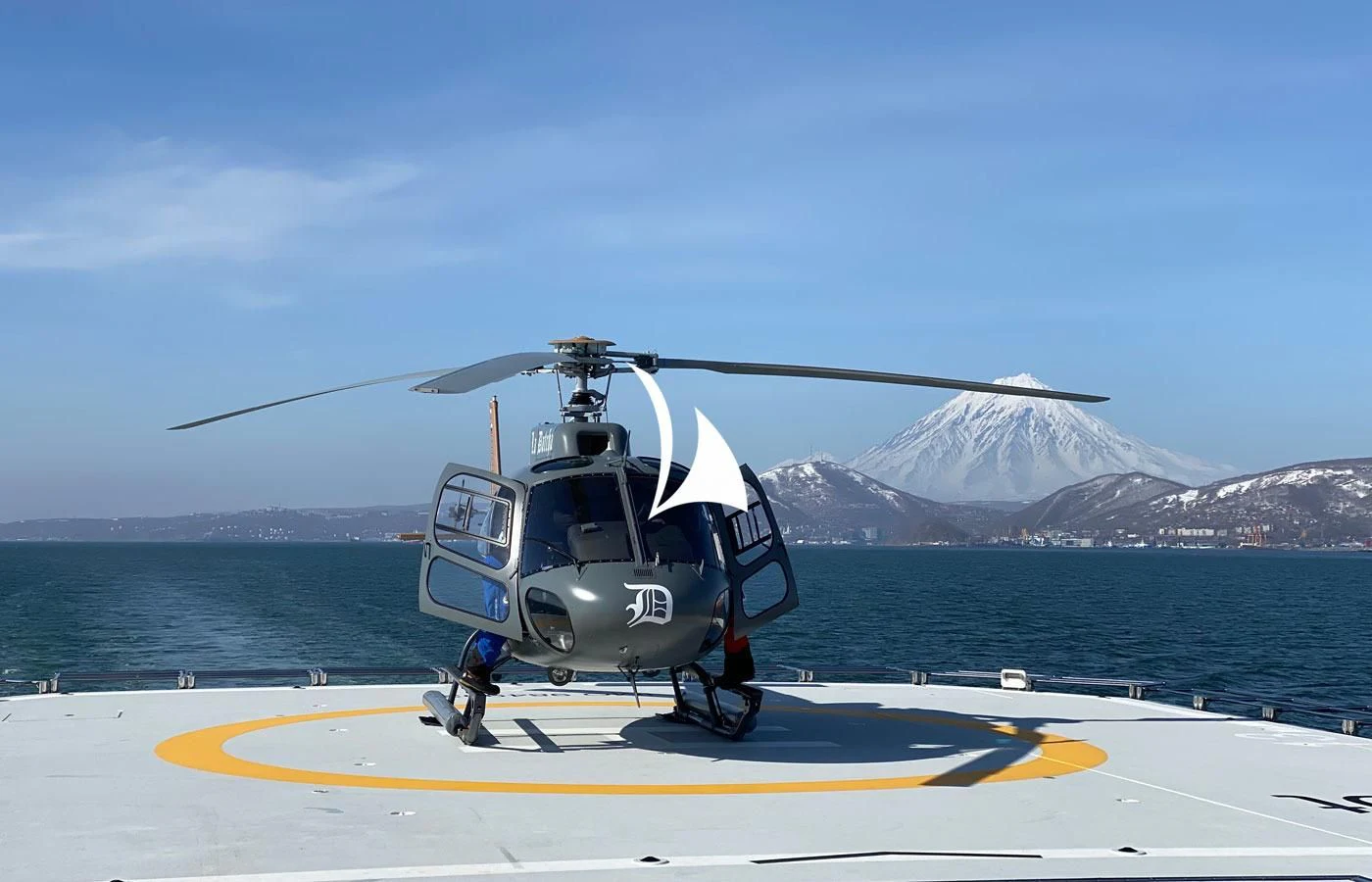 a helicopter on a runway aboard LA DATCHA Yacht for Sale