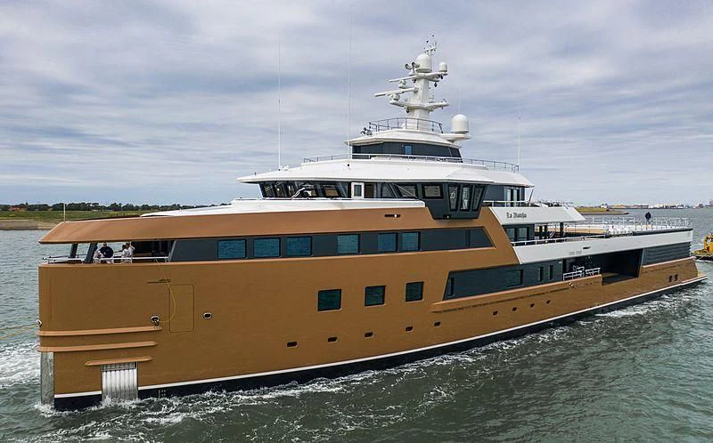 a large yellow and white ship aboard LA DATCHA Yacht for Sale