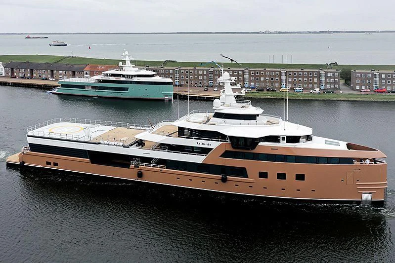 a large ship in the water aboard LA DATCHA Yacht for Sale