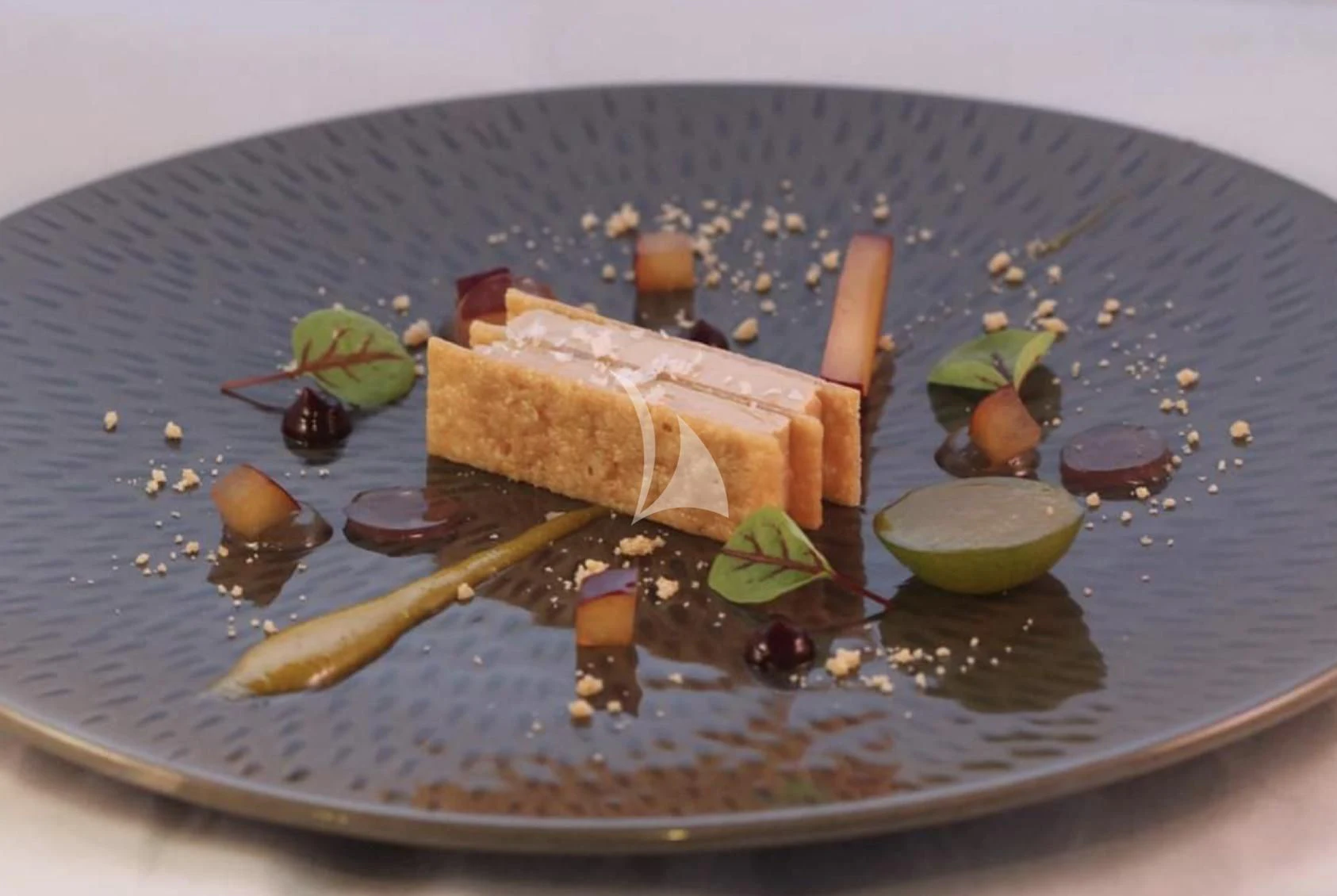 a plate of food aboard LA DATCHA Yacht for Sale