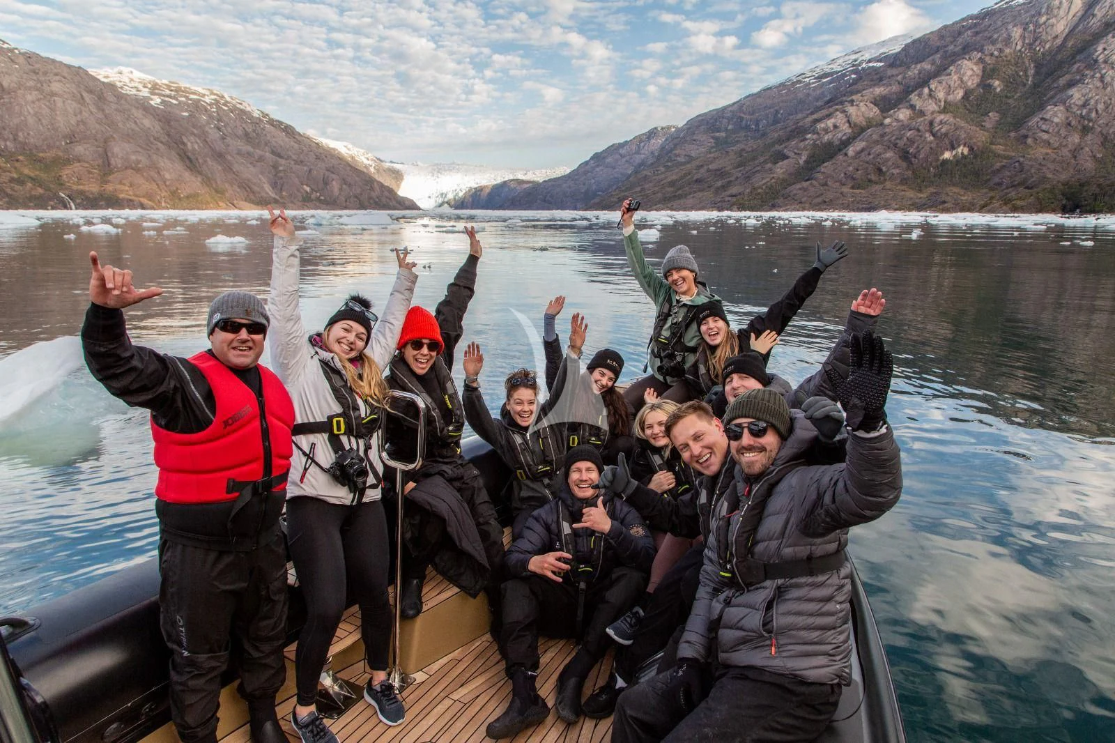 a group of people on a boat aboard LA DATCHA Yacht for Sale