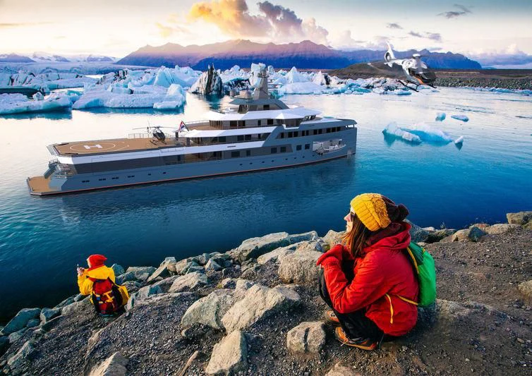a couple of people looking at a ship in the water aboard LA DATCHA Yacht for Sale