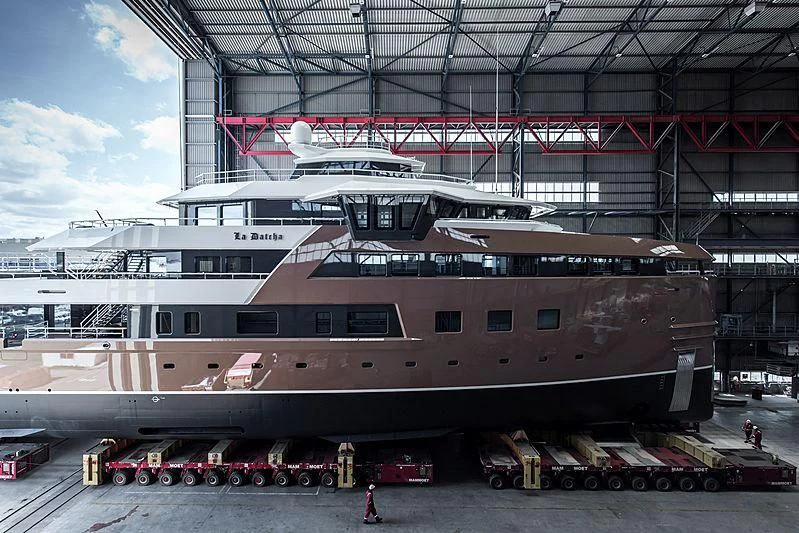 a large ship in a dock aboard LA DATCHA Yacht for Sale