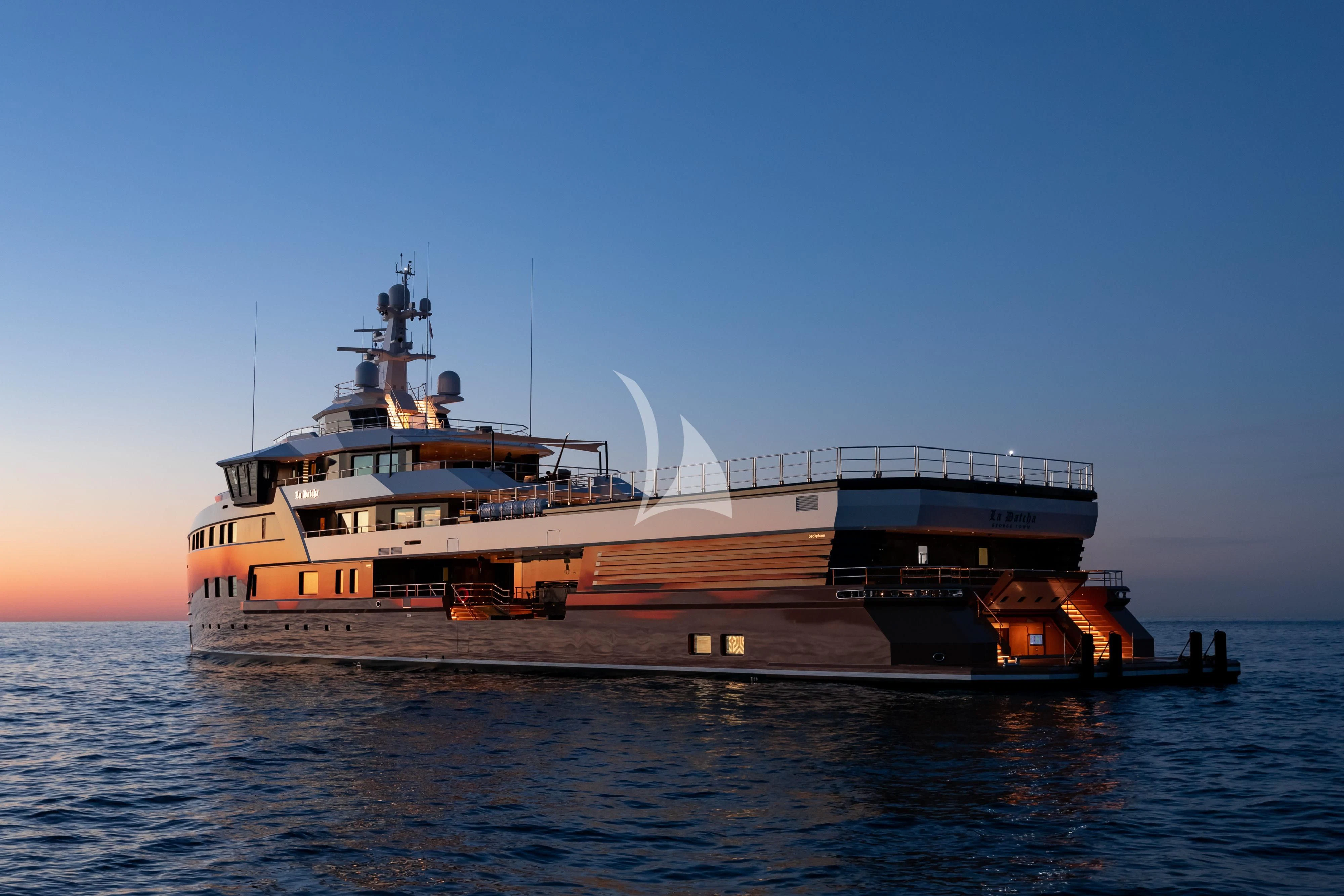 a large ship on the water aboard LA DATCHA Yacht for Sale