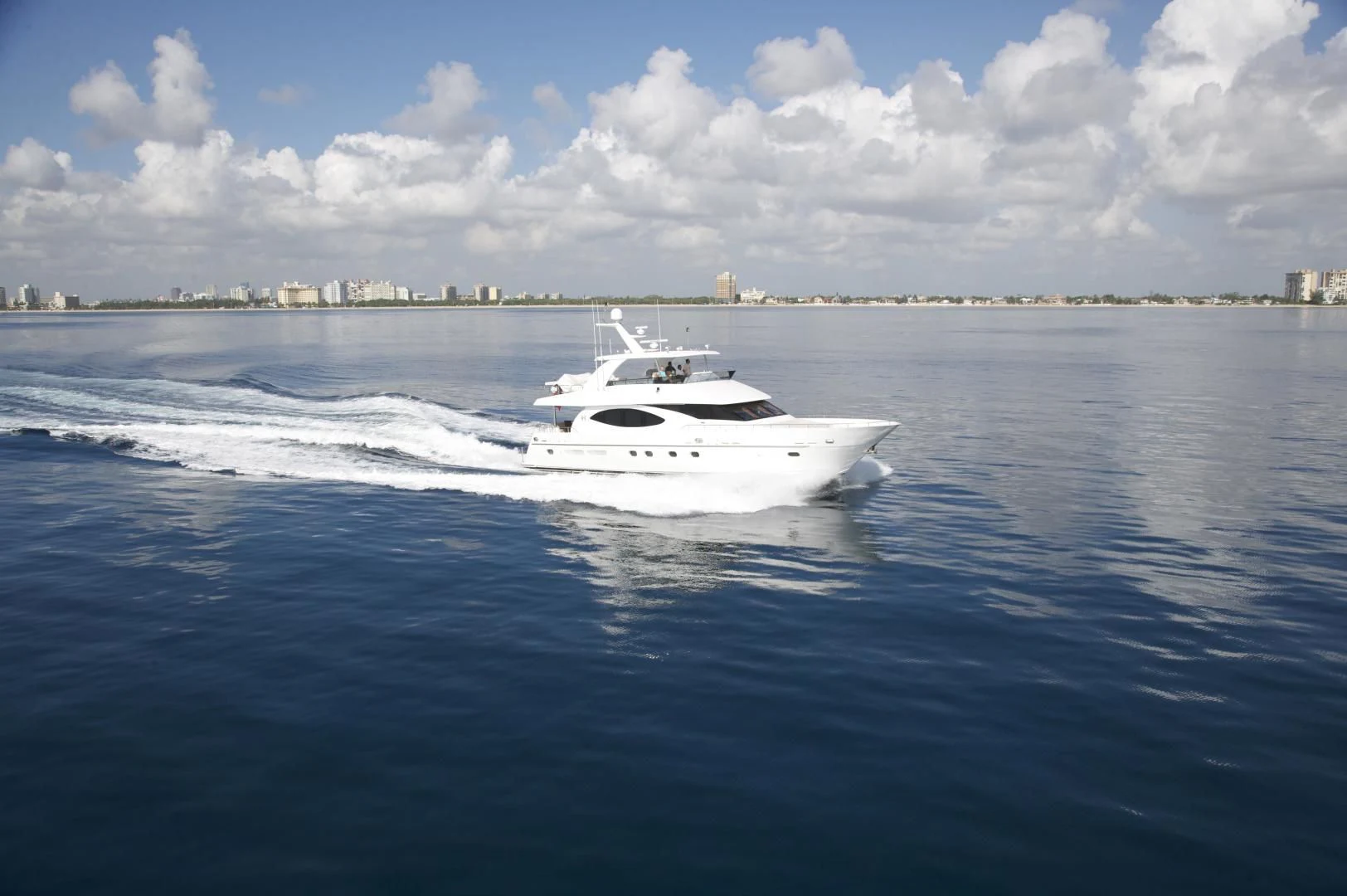 a white boat on the water aboard LADY C II Yacht for Sale