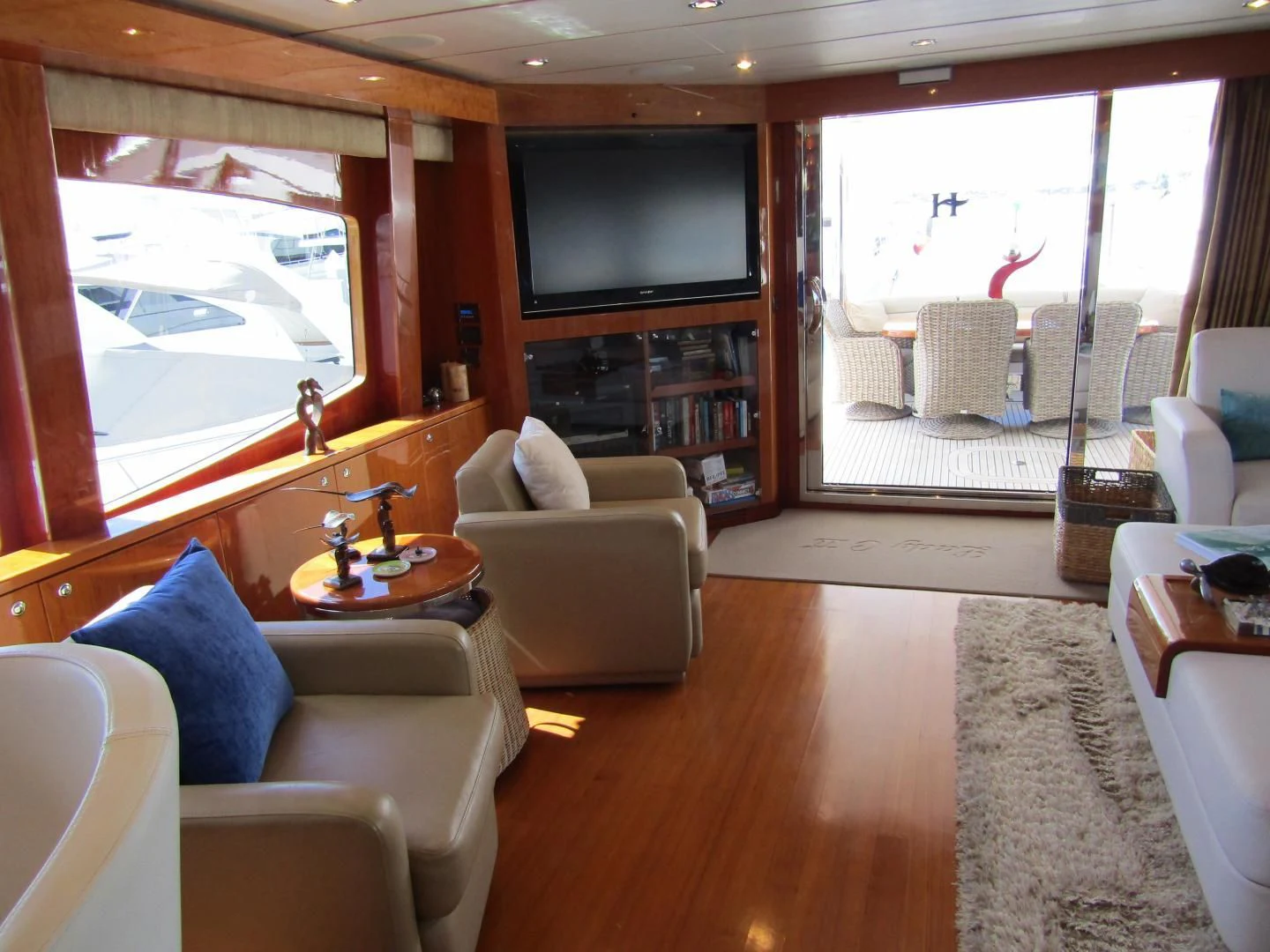 a living room with a large window aboard LADY C II Yacht for Sale