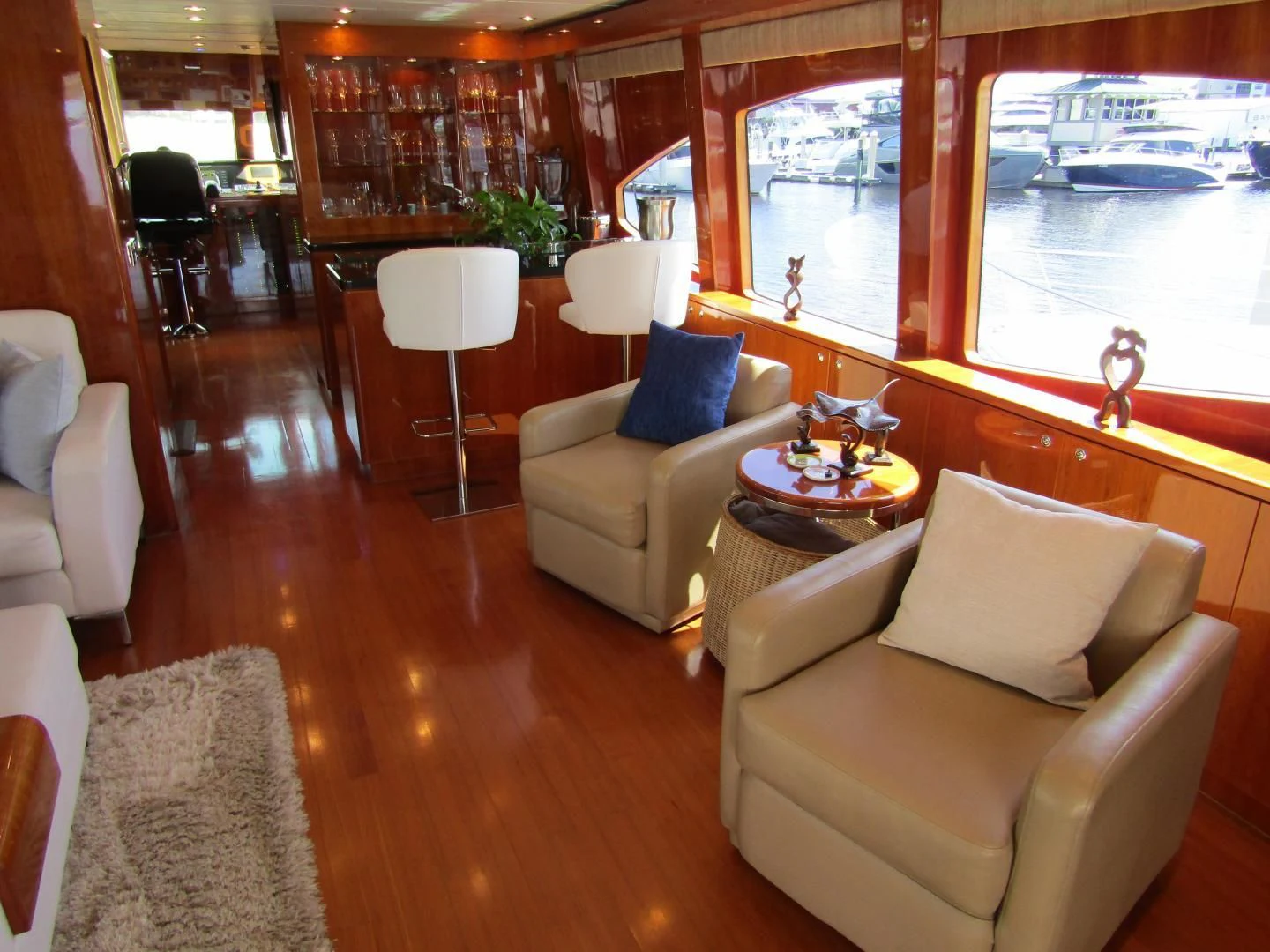 a living room with a large window aboard LADY C II Yacht for Sale