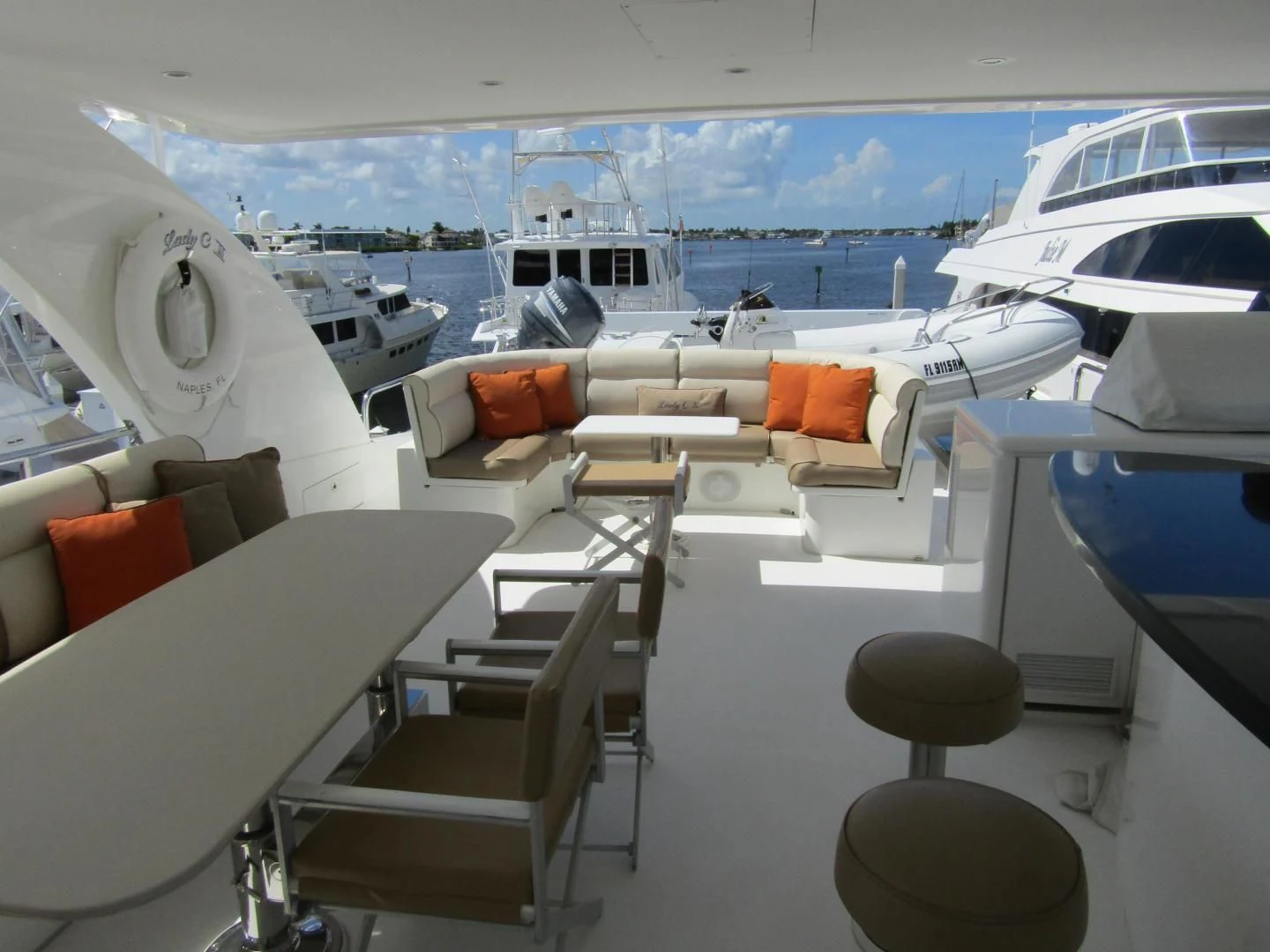 a room with a view of the water and boats aboard LADY C II Yacht for Sale