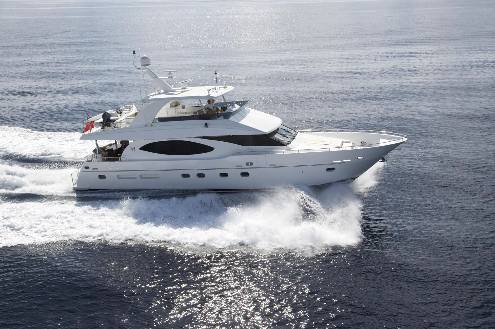 a white yacht on the water aboard LADY C II Yacht for Sale