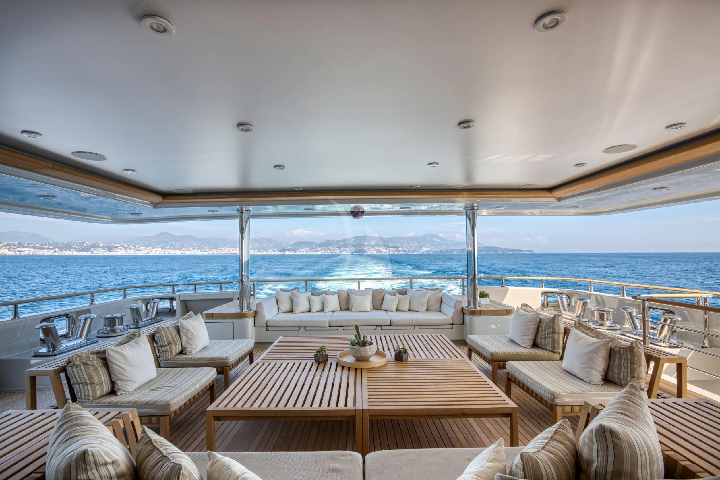 a room with a table and chairs aboard MARAYA Yacht for Sale