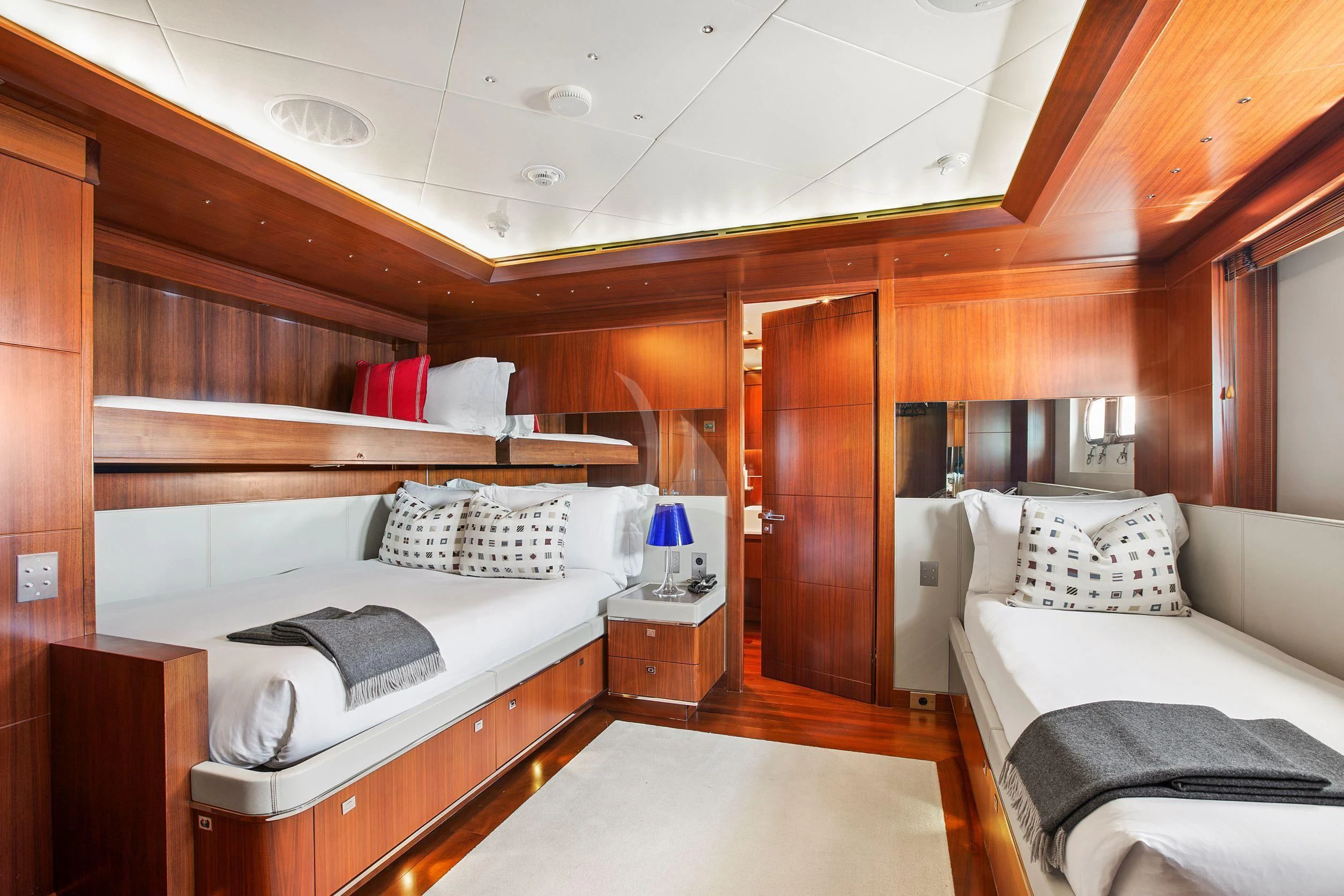 a room with two beds aboard MARAYA Yacht for Sale
