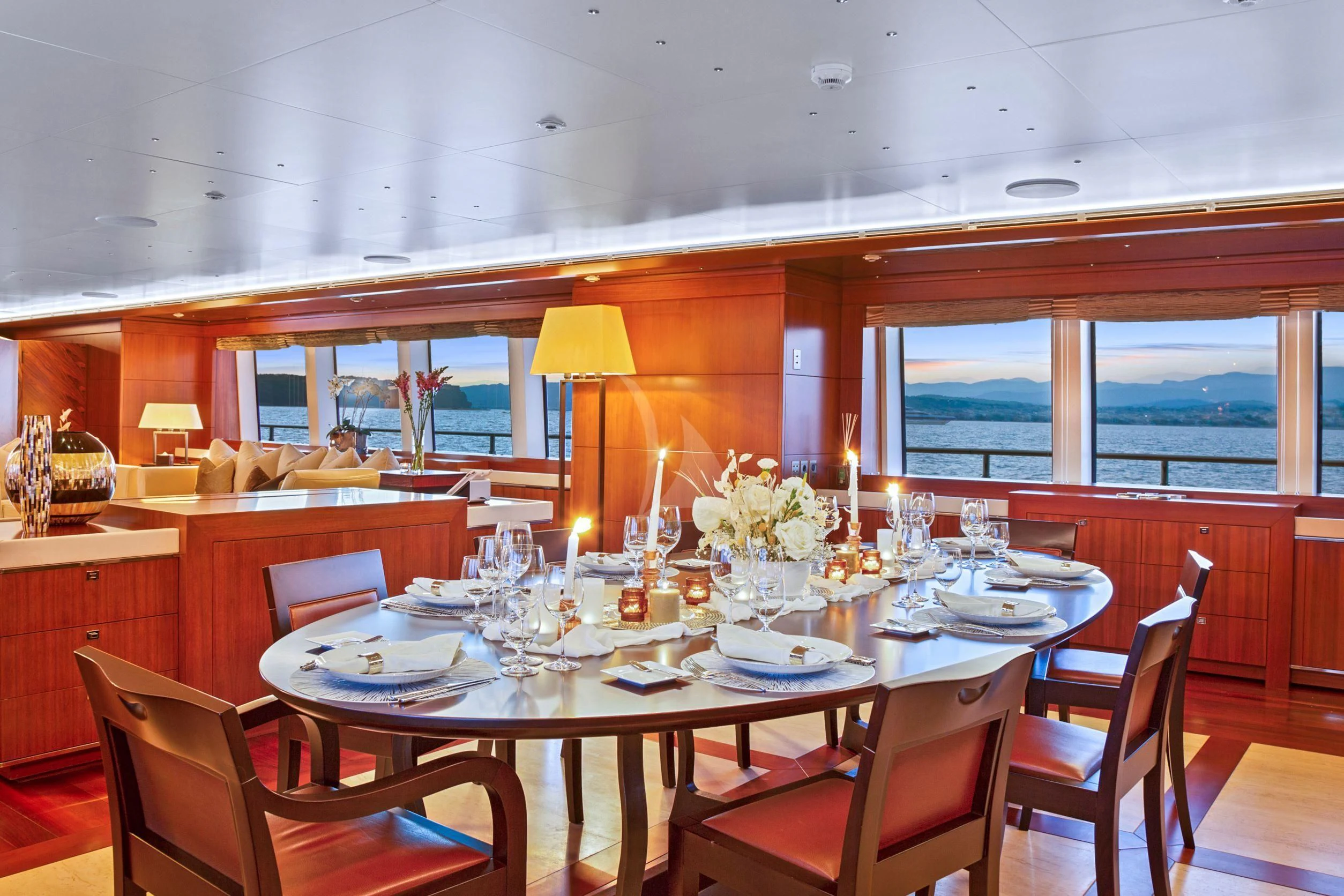 a dining room with a table and chairs aboard MARAYA Yacht for Sale