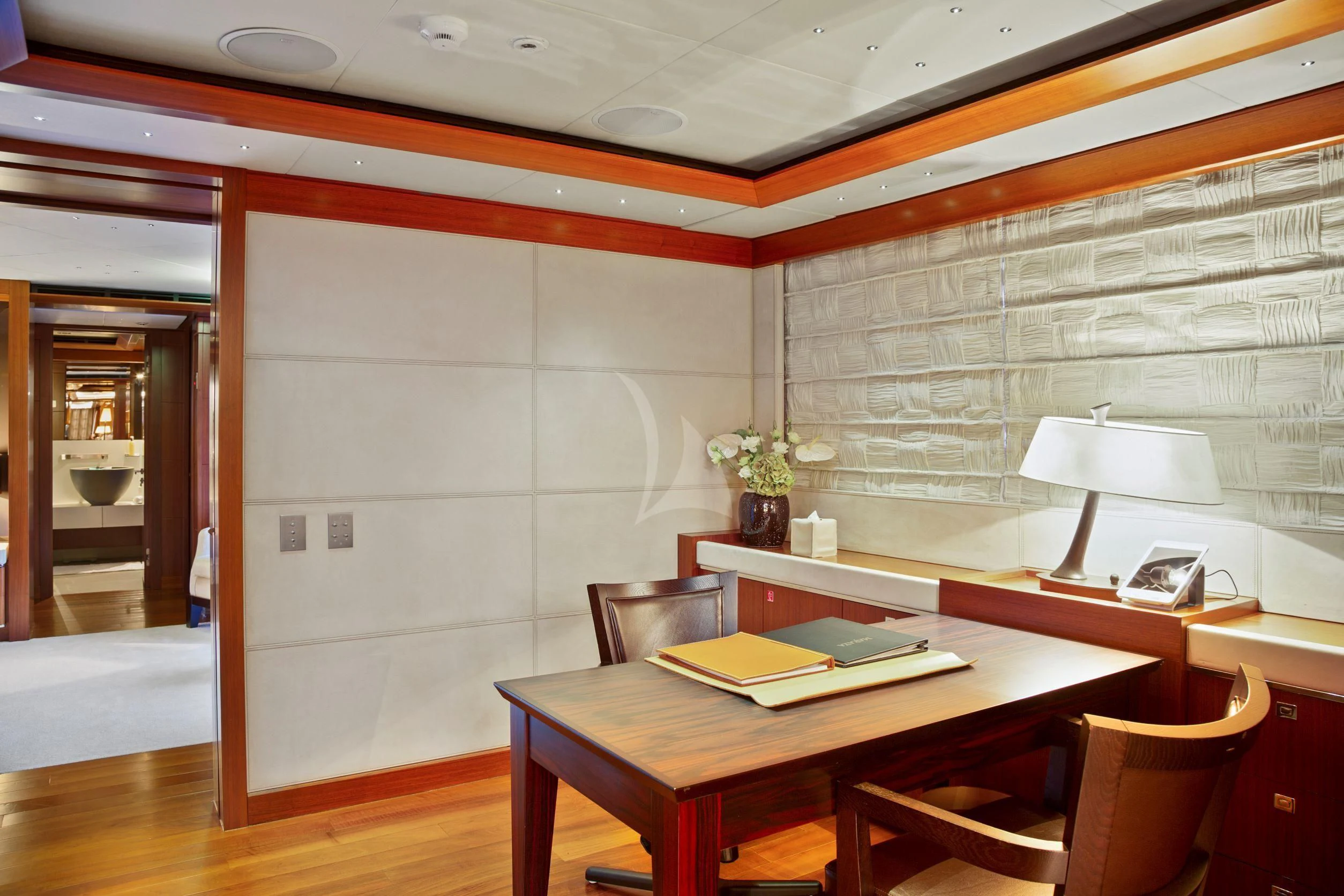 a room with a table and chairs aboard MARAYA Yacht for Sale