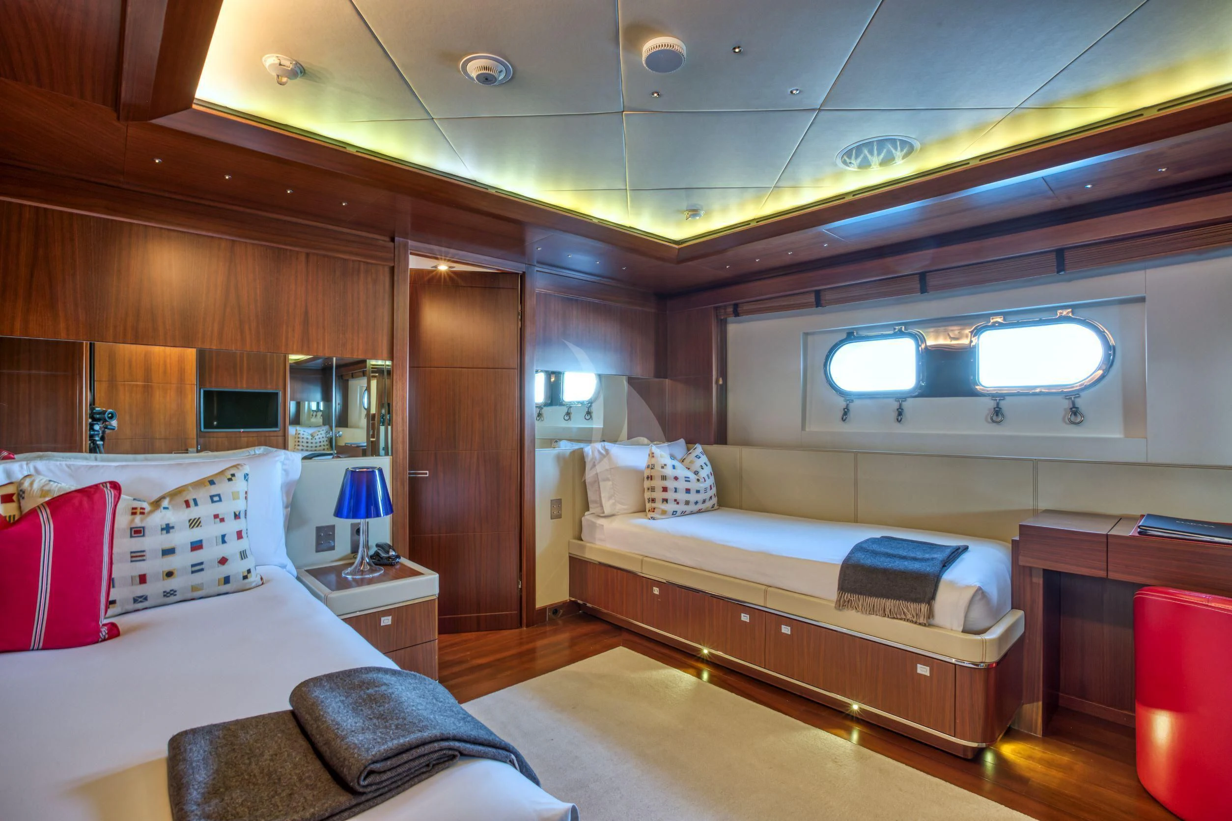 a room with two beds aboard MARAYA Yacht for Sale
