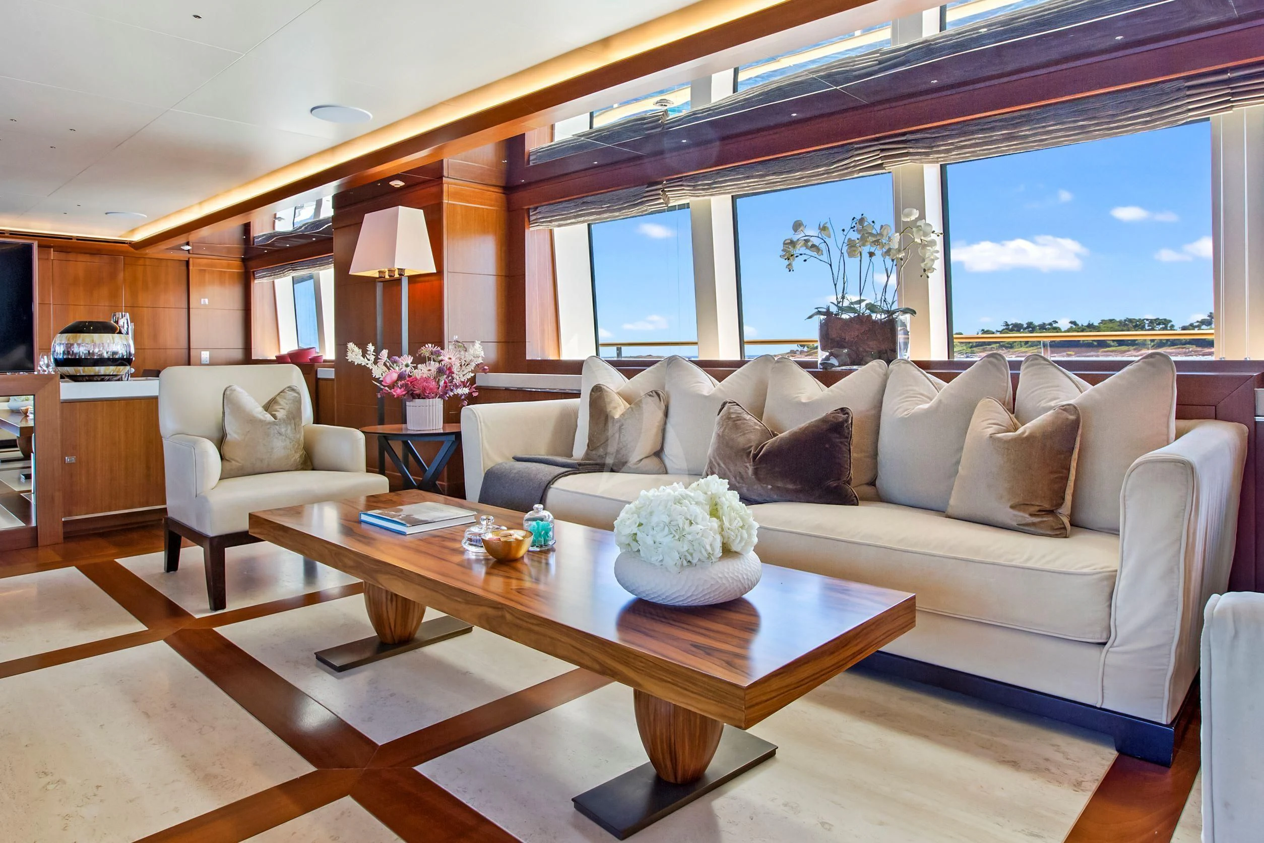 a living room with a large window aboard MARAYA Yacht for Sale