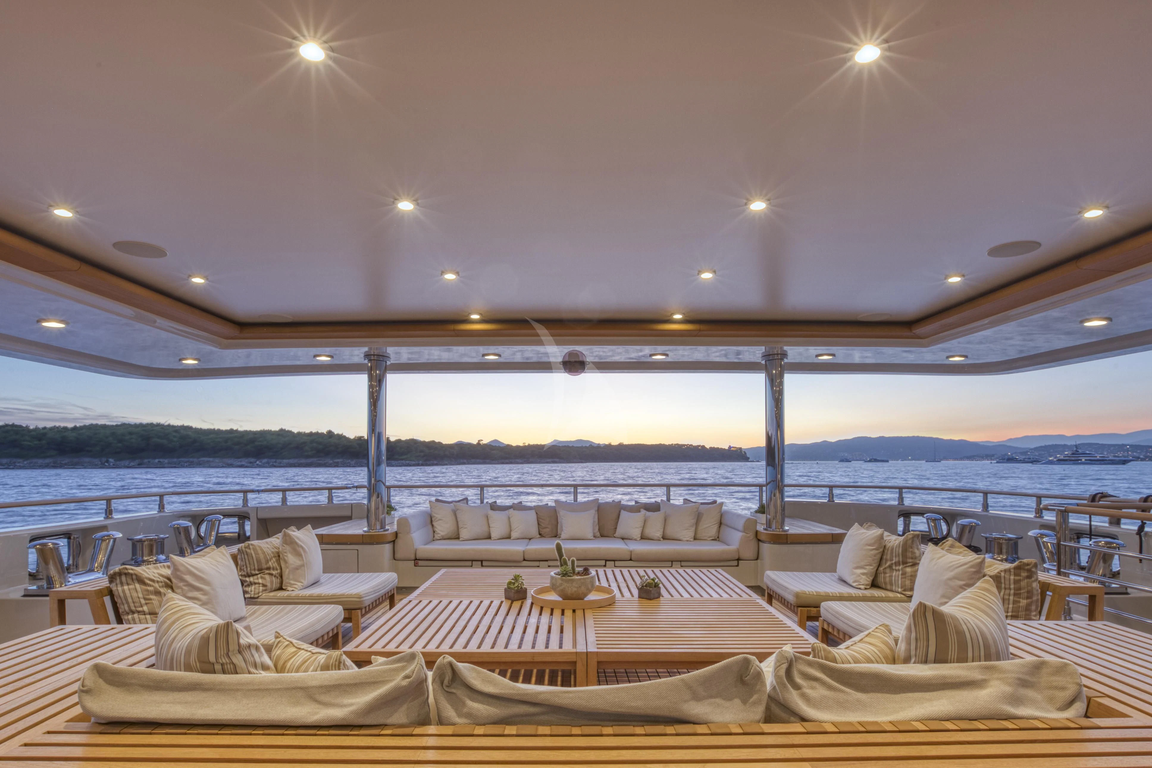 a room with a view of the water and the beach aboard MARAYA Yacht for Sale