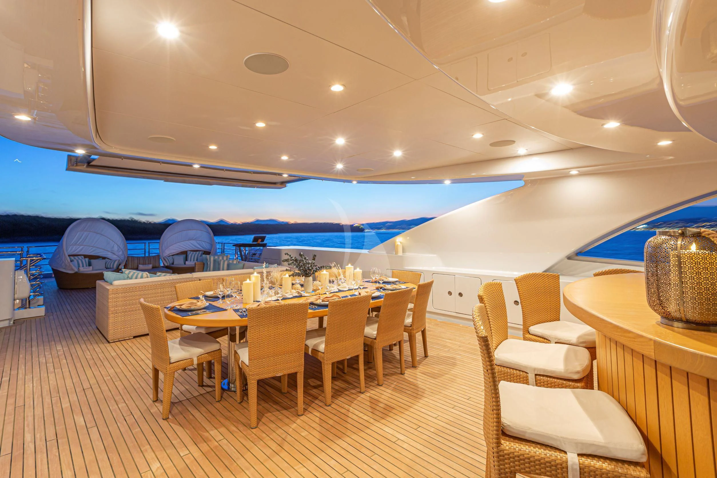 a room with tables and chairs aboard MARAYA Yacht for Sale