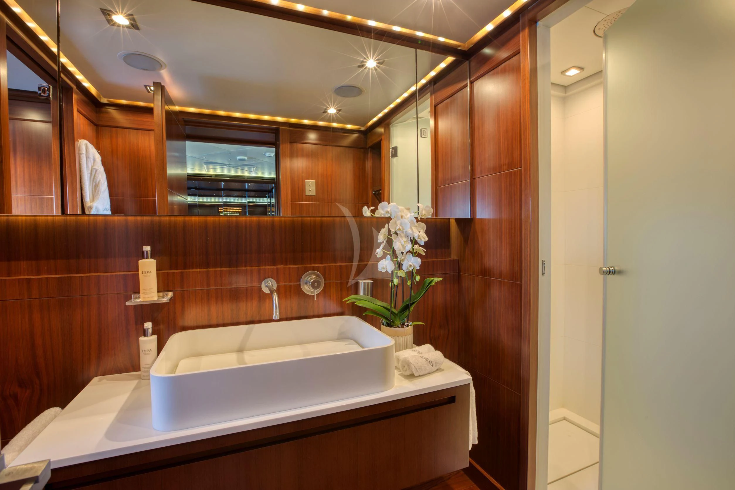 a bathroom with a large mirror aboard MARAYA Yacht for Sale