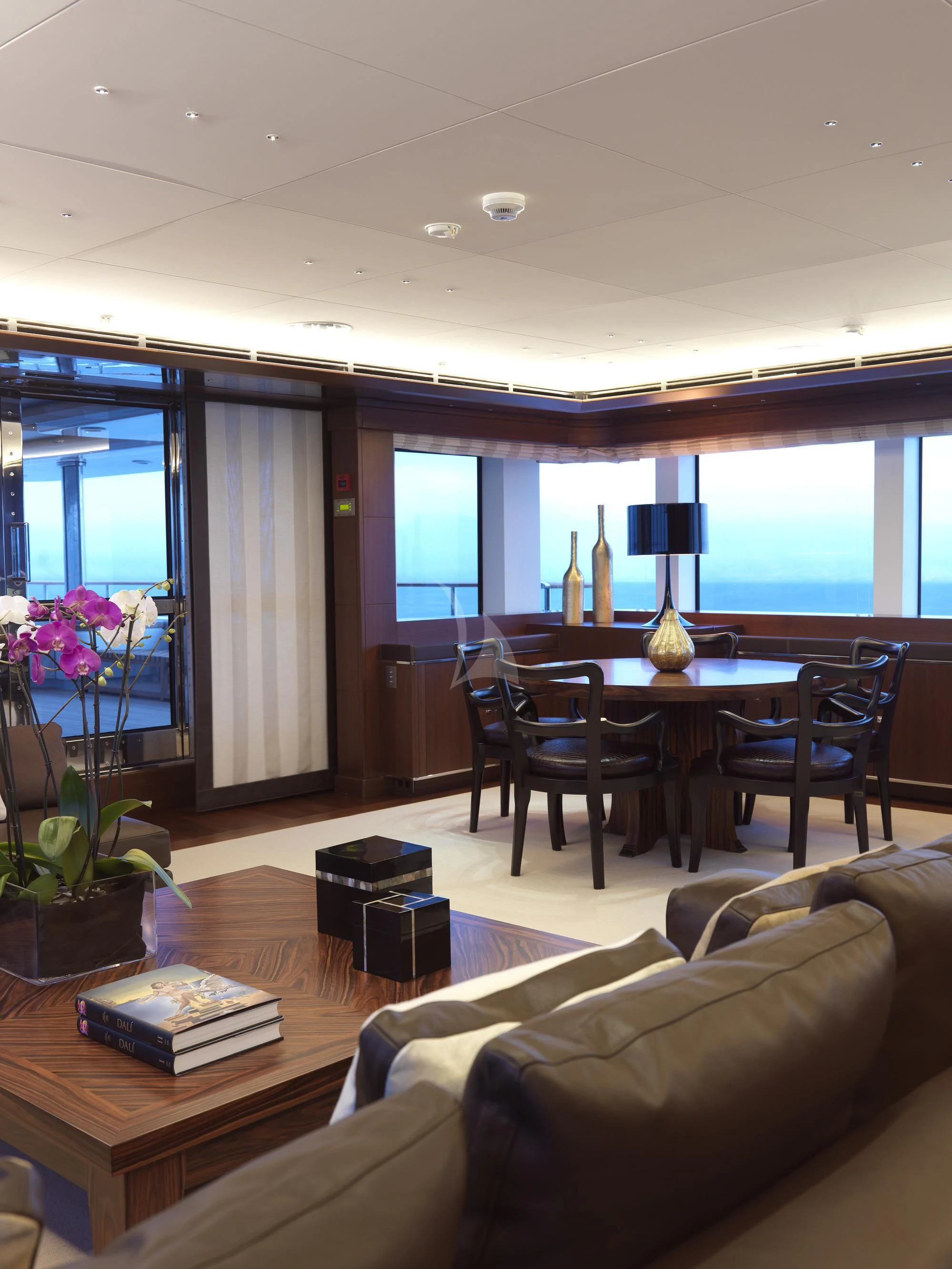a living room with a couch and a table aboard MARAYA Yacht for Sale