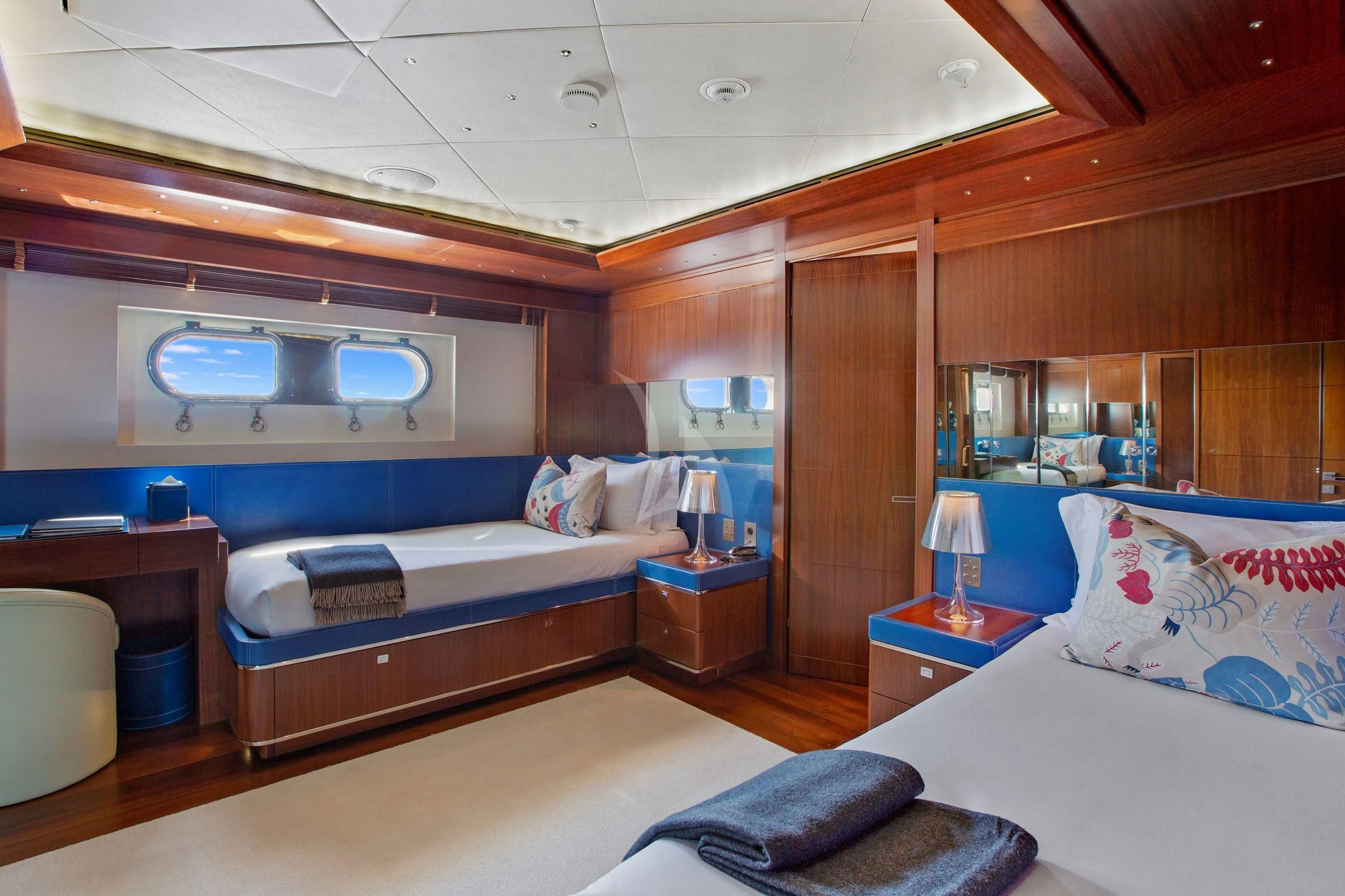 a room with beds and a tv aboard MARAYA Yacht for Sale