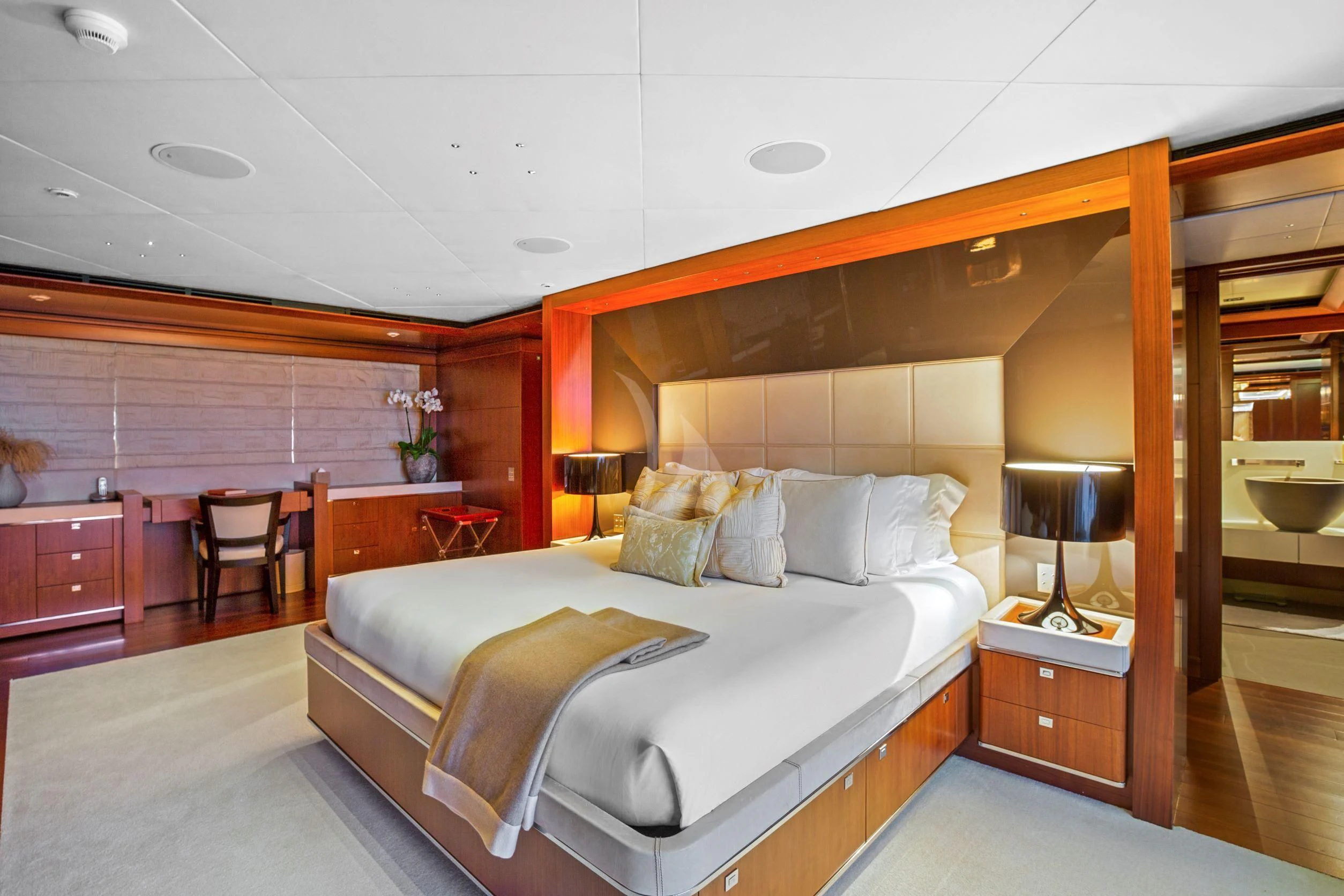a large bedroom with a large bed aboard MARAYA Yacht for Sale
