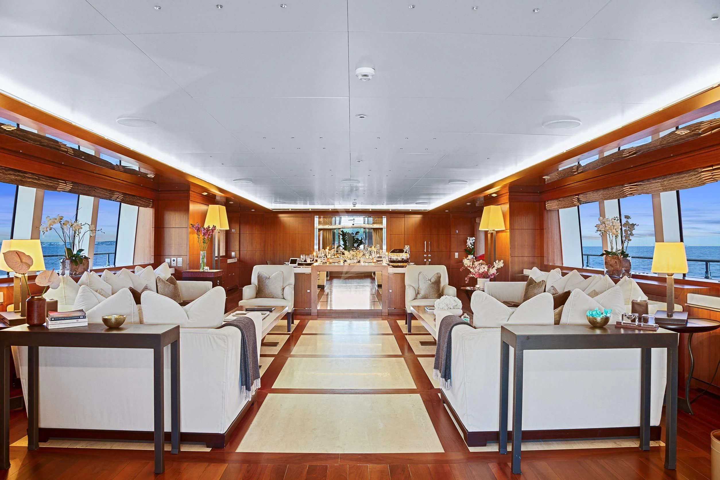 a room with a table and chairs aboard MARAYA Yacht for Sale