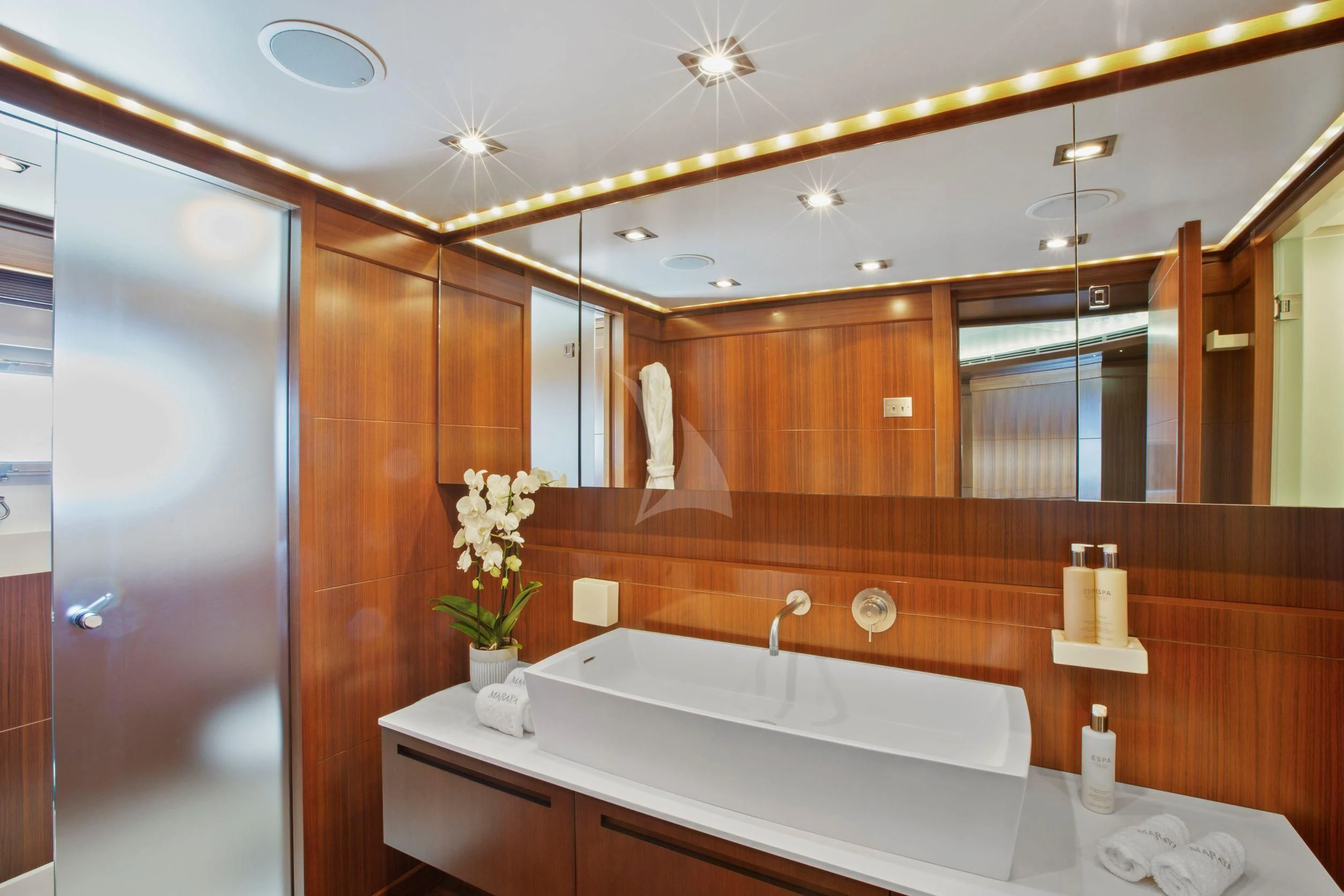 a bathroom with a large mirror aboard MARAYA Yacht for Sale