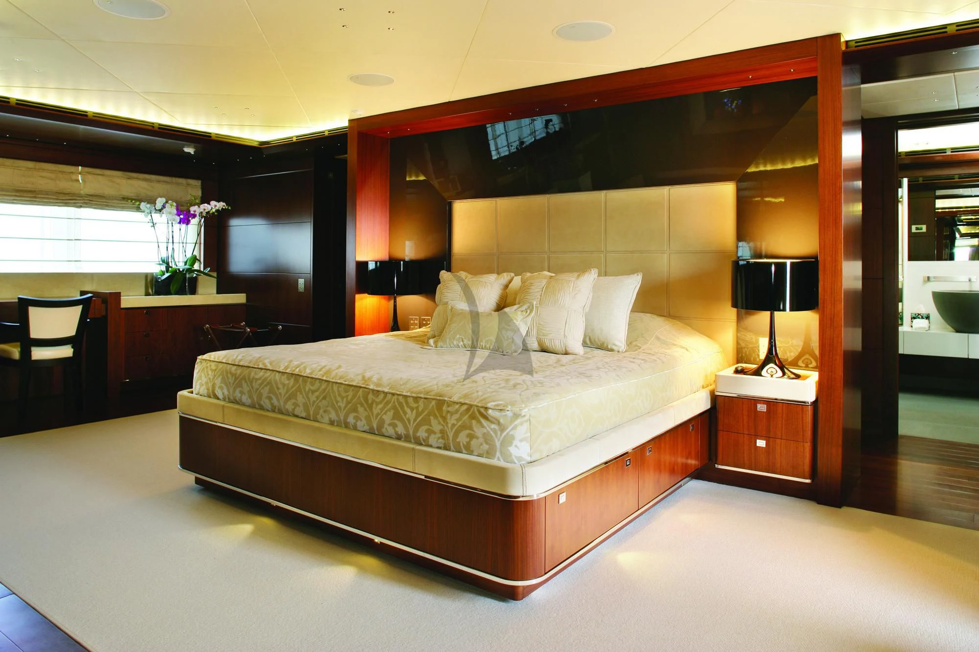 a large bed in a room aboard MARAYA Yacht for Sale