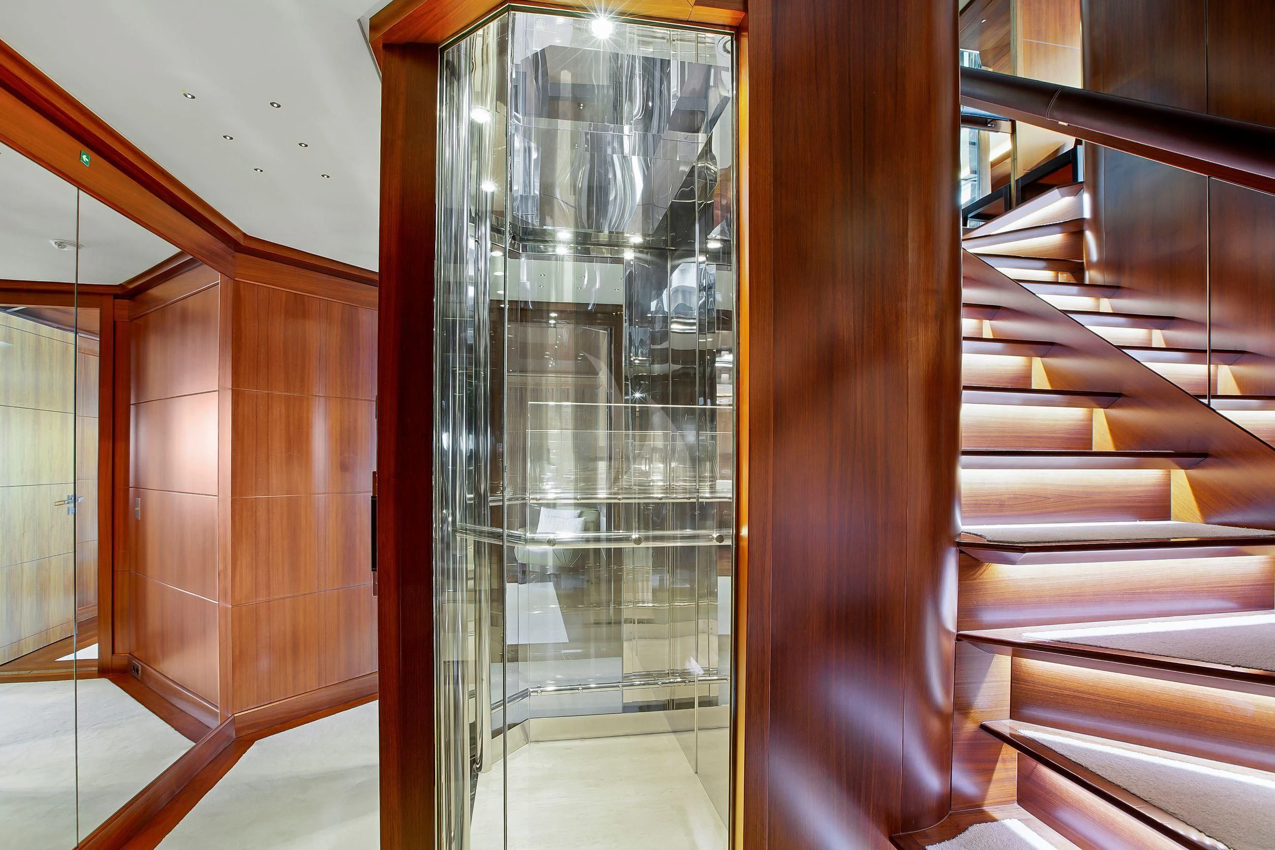 a room with wooden cabinets aboard MARAYA Yacht for Sale