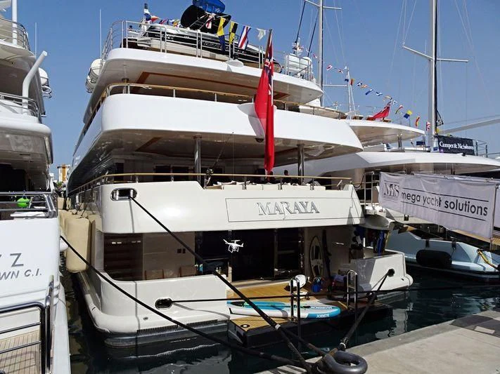 a large white boat docked aboard MARAYA Yacht for Sale