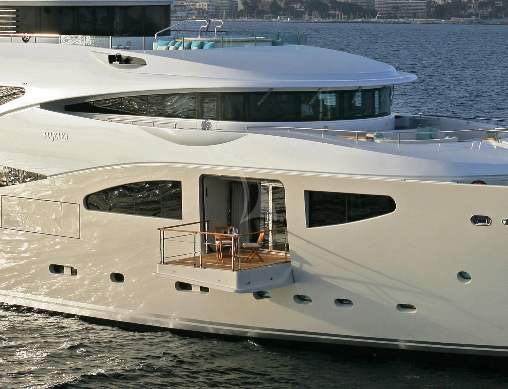 a white yacht on the water aboard MARAYA Yacht for Sale
