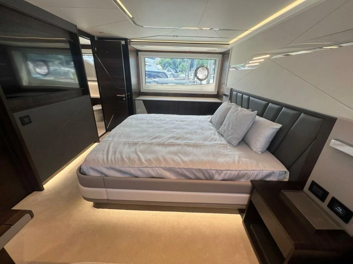 a bed in a room aboard 75 SPORT YACHT Yacht for Sale