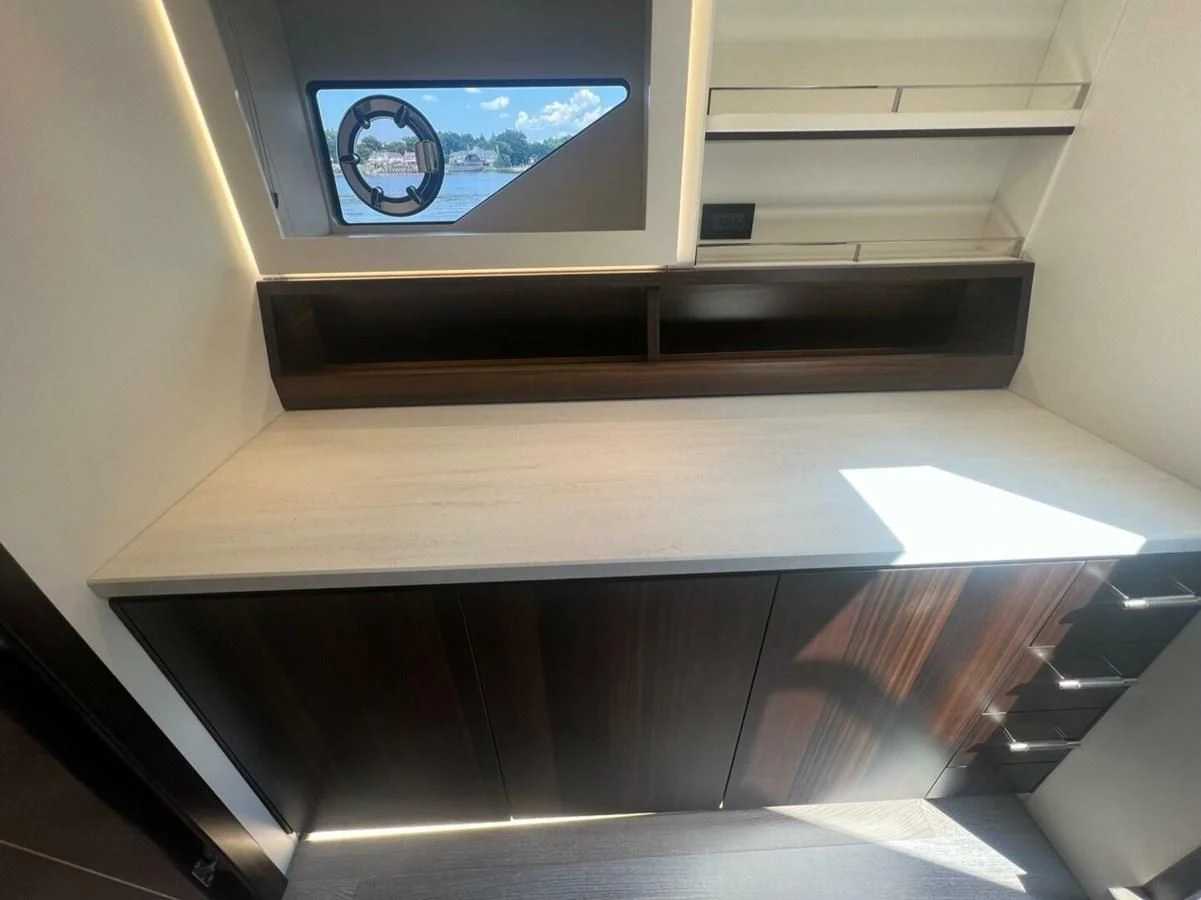 a clock on a wall aboard 75 SPORT YACHT Yacht for Sale