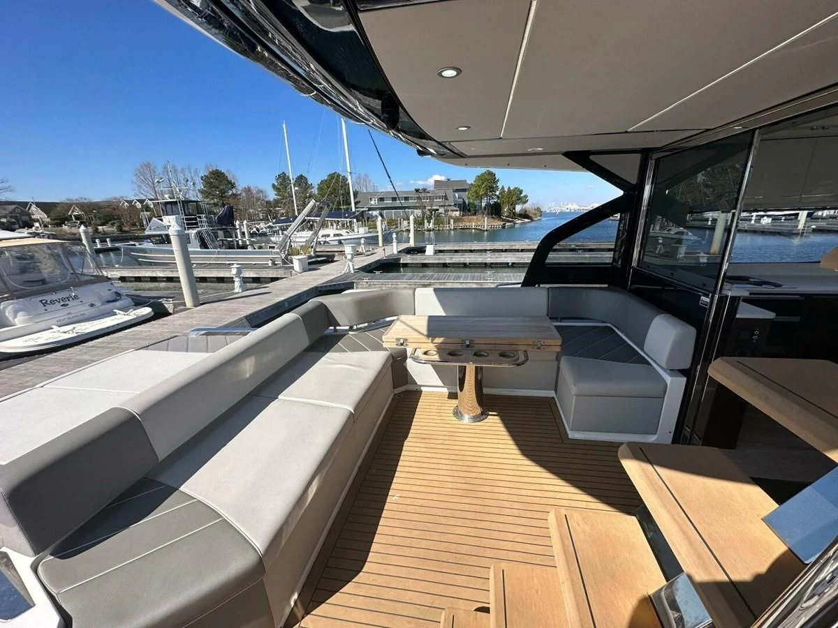 a deck with a view of a city and water aboard 75 SPORT YACHT Yacht for Sale