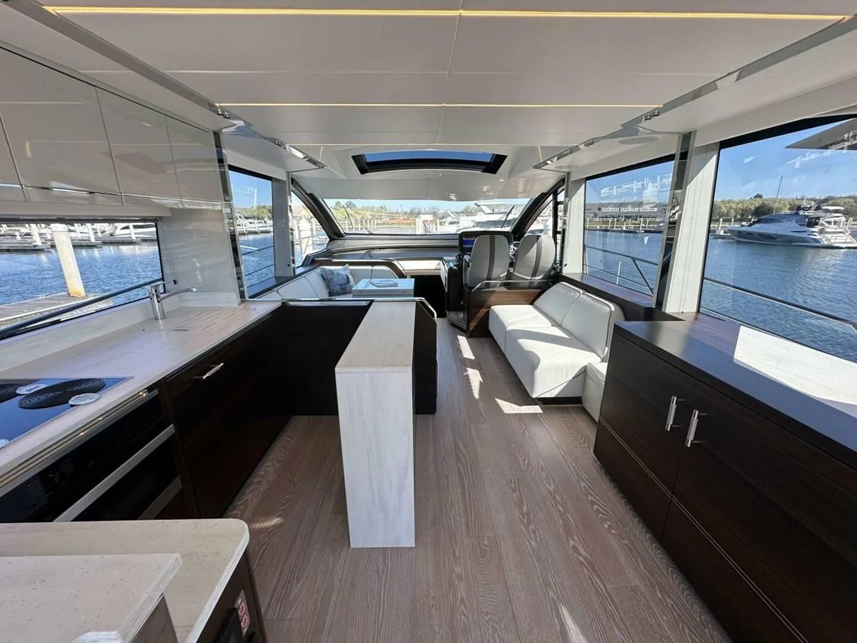 a boat with a bench aboard 75 SPORT YACHT Yacht for Sale