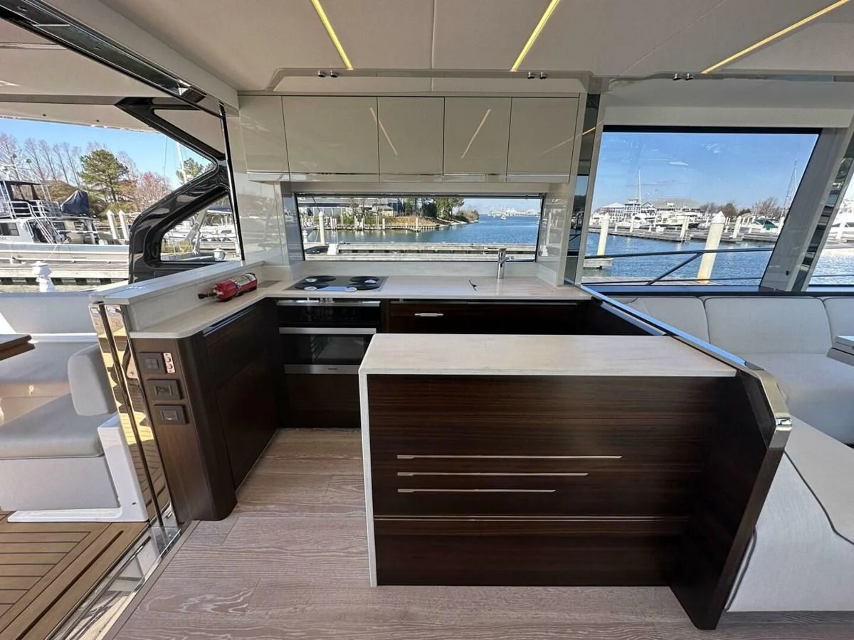 a room with a desk and a window aboard 75 SPORT YACHT Yacht for Sale