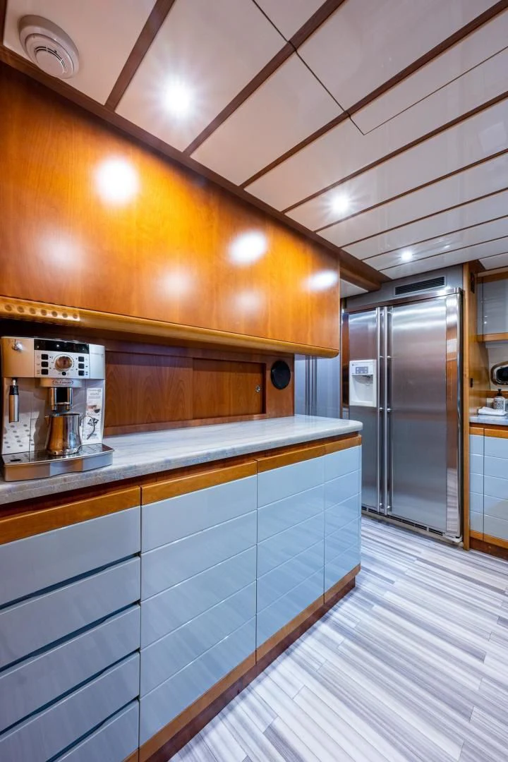 a kitchen with a microwave oven and a stove aboard EVERYTHING GOOD Yacht for Sale